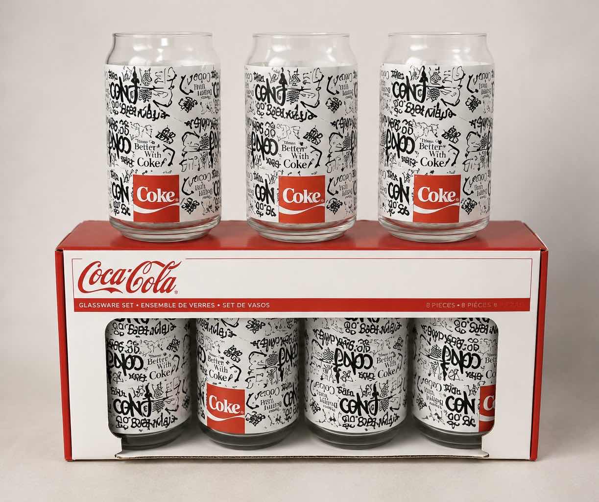 Photo 1 of COCA-COLA 7 PIECE GLASSWARE SET WITH BLACK & WHITE GRAPHIC DESIGN- COLLECTIBLE COKE DRINKING GLASES ESTIMATED RETAIL VALUE:$50