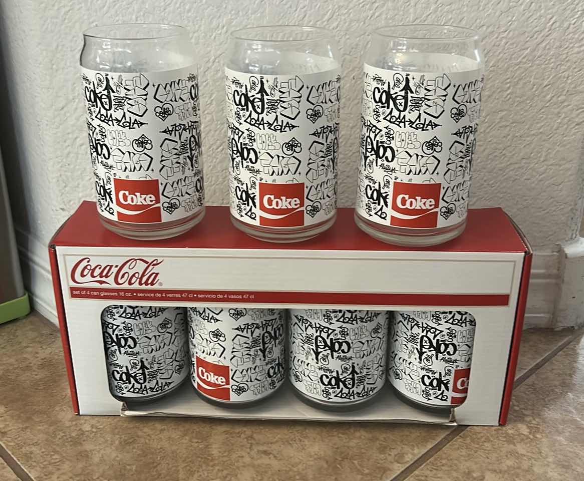 Photo 1 of COCA-COLA 7 PIECE GLASSWARE SET WITH BLACK & WHITE GRAPHIC DESIGN- COLLECTIBLE COKE DRINKING GLASES ESTIMATED RETAIL VALUE:$50