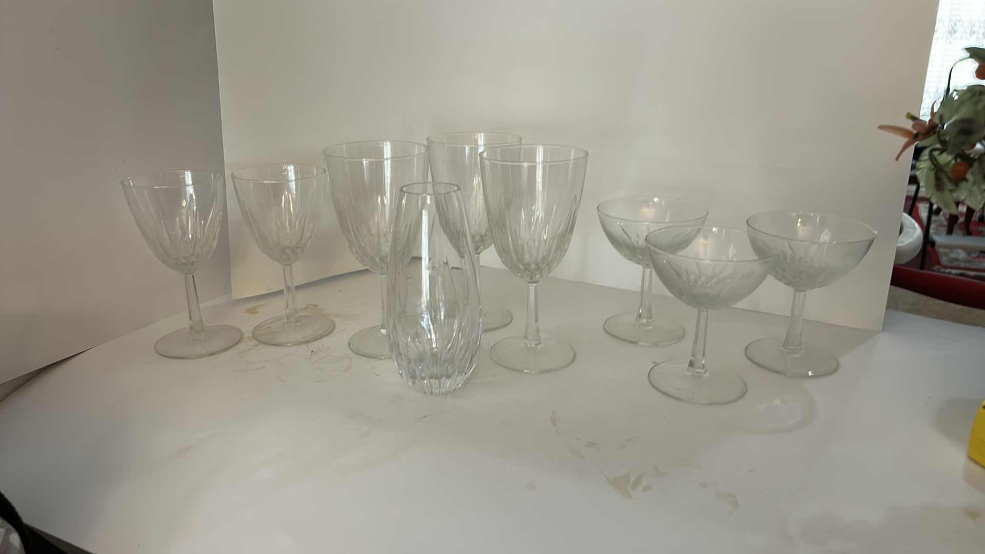 Photo 1 of ASSORTED CLEAR CRYSTAL STEMWARE INCLUDING WINE GLASSES, CHAMPAGNE COUPES AND SMALL CRYSTAL VASE.
ELEGANT CUT-CRYSTAL DESIGN WITH MATCHING PATTERN.
ESTIMATED RETAIL VALUE: $125 FOR THE GROUP.