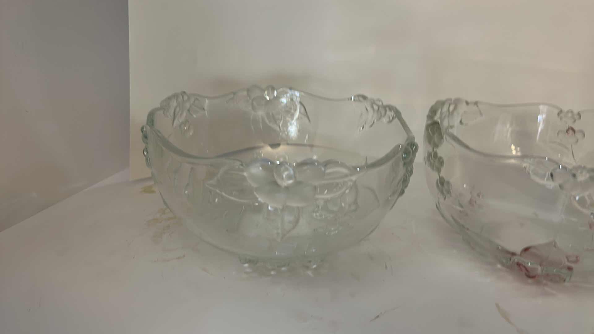 Photo 1 of 2-PRESSED GLASS SERVING BOWLS W EMBOSSED FLORAL DESIGN AND SCALLOPED RIMS 9” x H5”