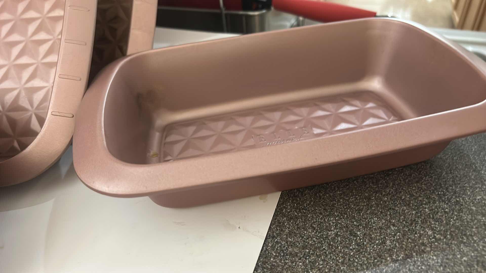 View 4 of ROSE GOLD NONSTICK BAKEWARE SET WITH BAKING PANS, MUFFIN PANS & LOAF PAN
COORDINATING METALLIC FINISH WITH TEXTURED BAKING SURFACES
ESTIMATED RETAIL VALUE: $75–$100