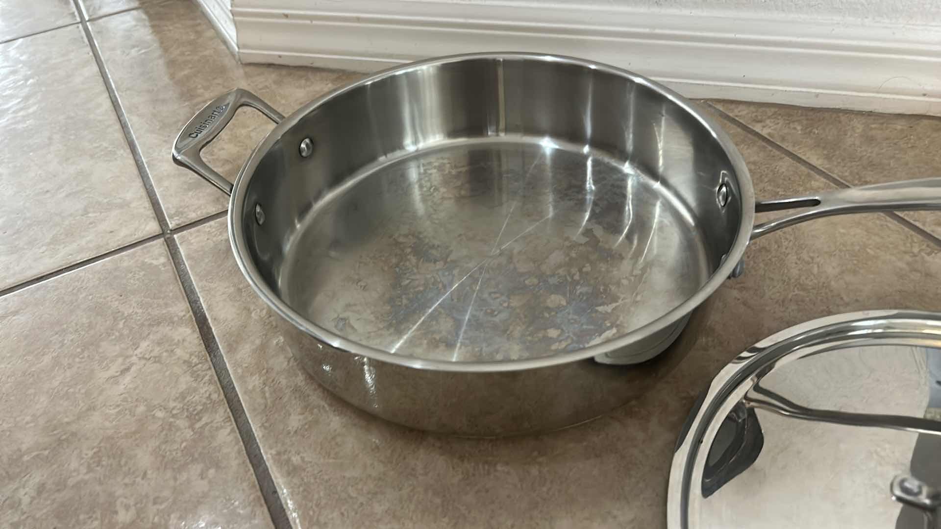 Photo 1 of ASSORTED COOKWARE LOT WITH WOKS, SKILLET, LIDDED PAN & DOME LIDS
MIXED STAINLESS STEEL AND NONSTICK COOKWARE
ESTIMATED RETAIL VALUE: $100–$150