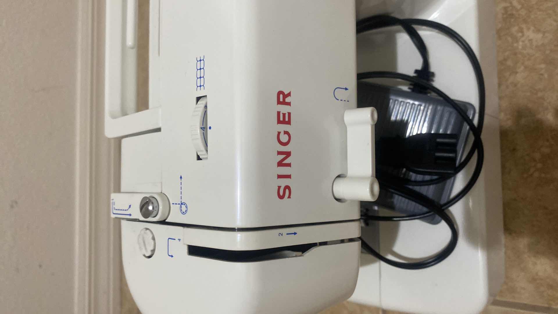 View 2 of SINGER SEWING MACHINE MODEL 1507 WITH COVER