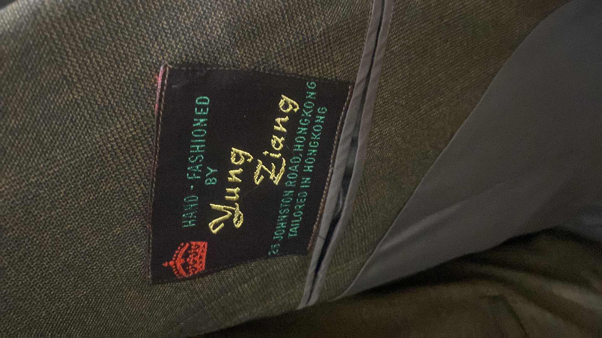 Photo 1 of HAND FASHIONED MEN’S SUIT FROM HONG KONG ESTIMATED SIZE 36 TO 40