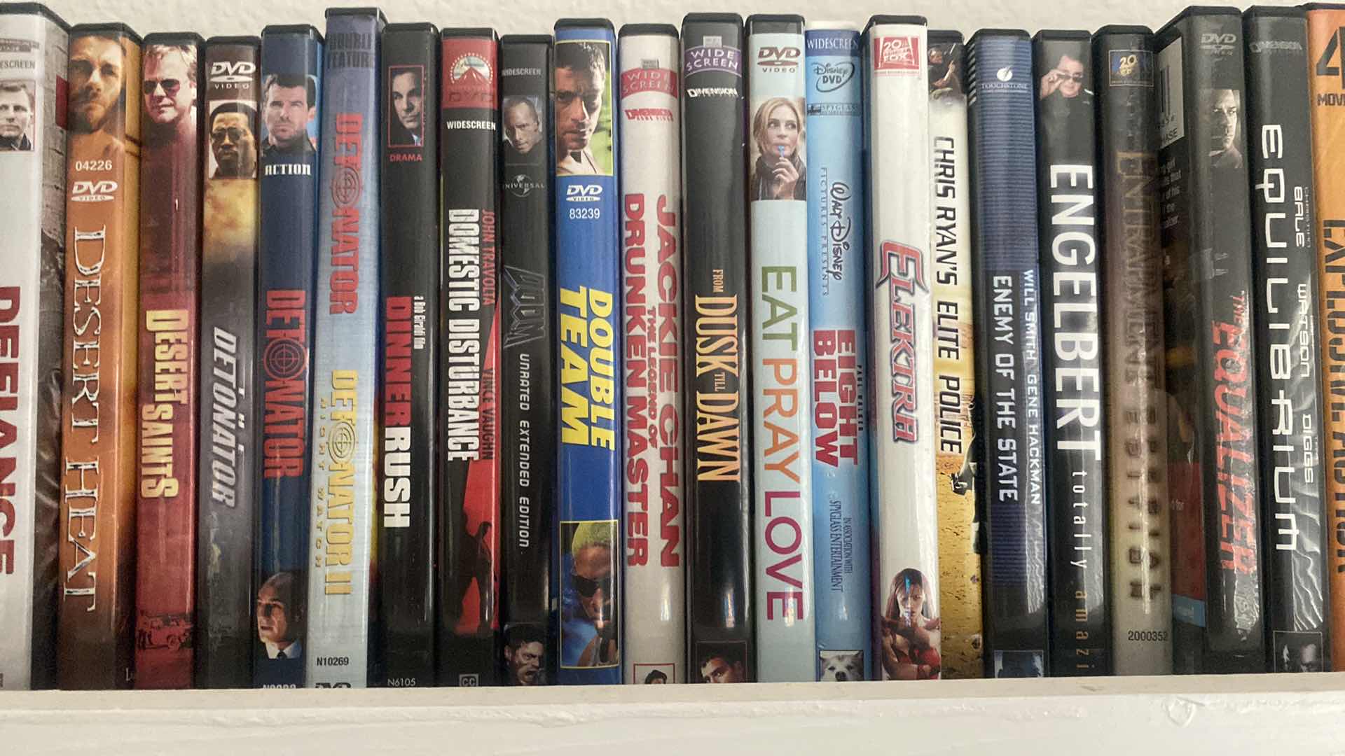 Photo 1 of SHELF OF 150 DVD MOVIES SEE PICTURES