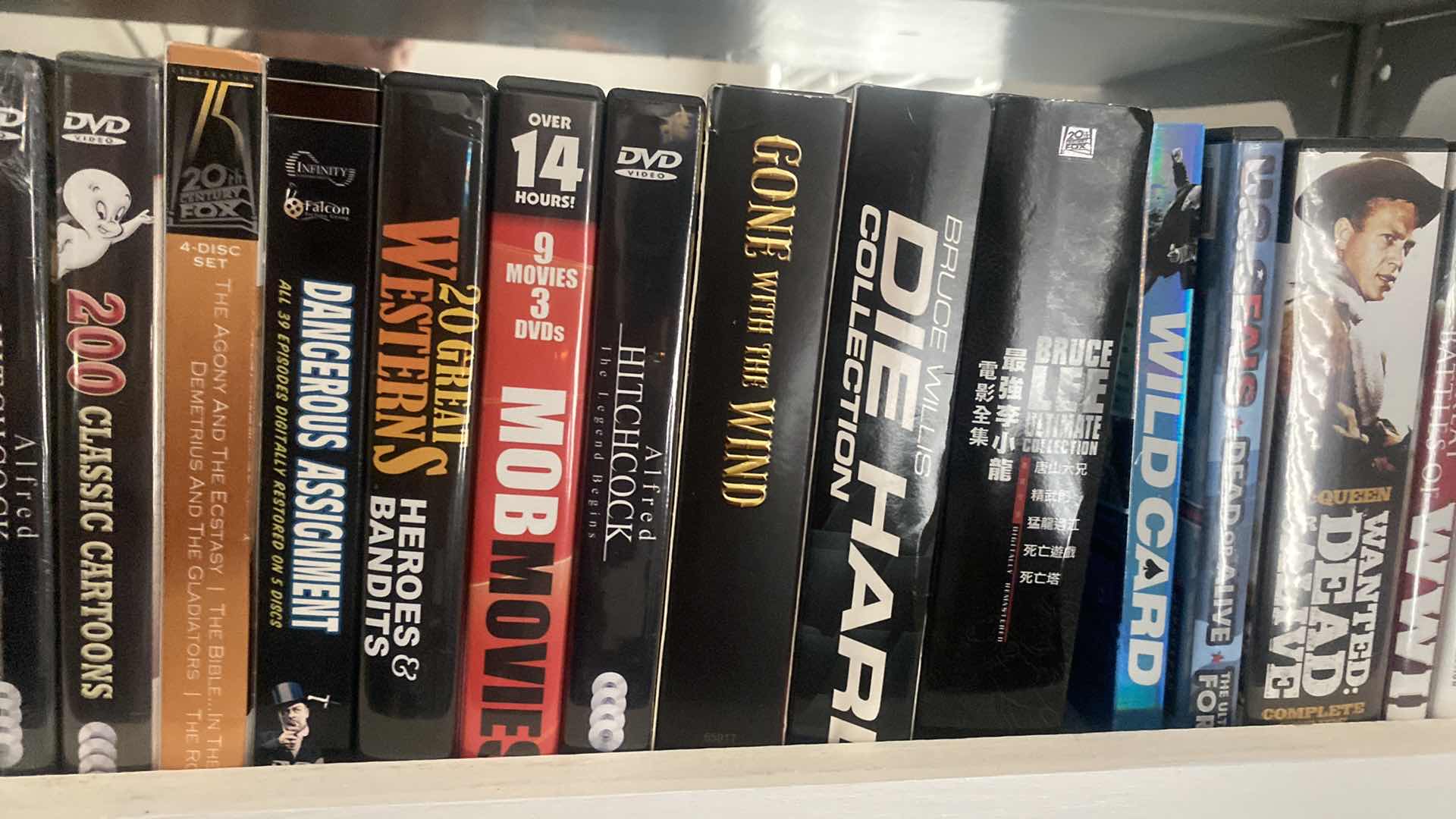Photo 1 of SHELF OF 135 DVD MOVIES SEE PICTURES