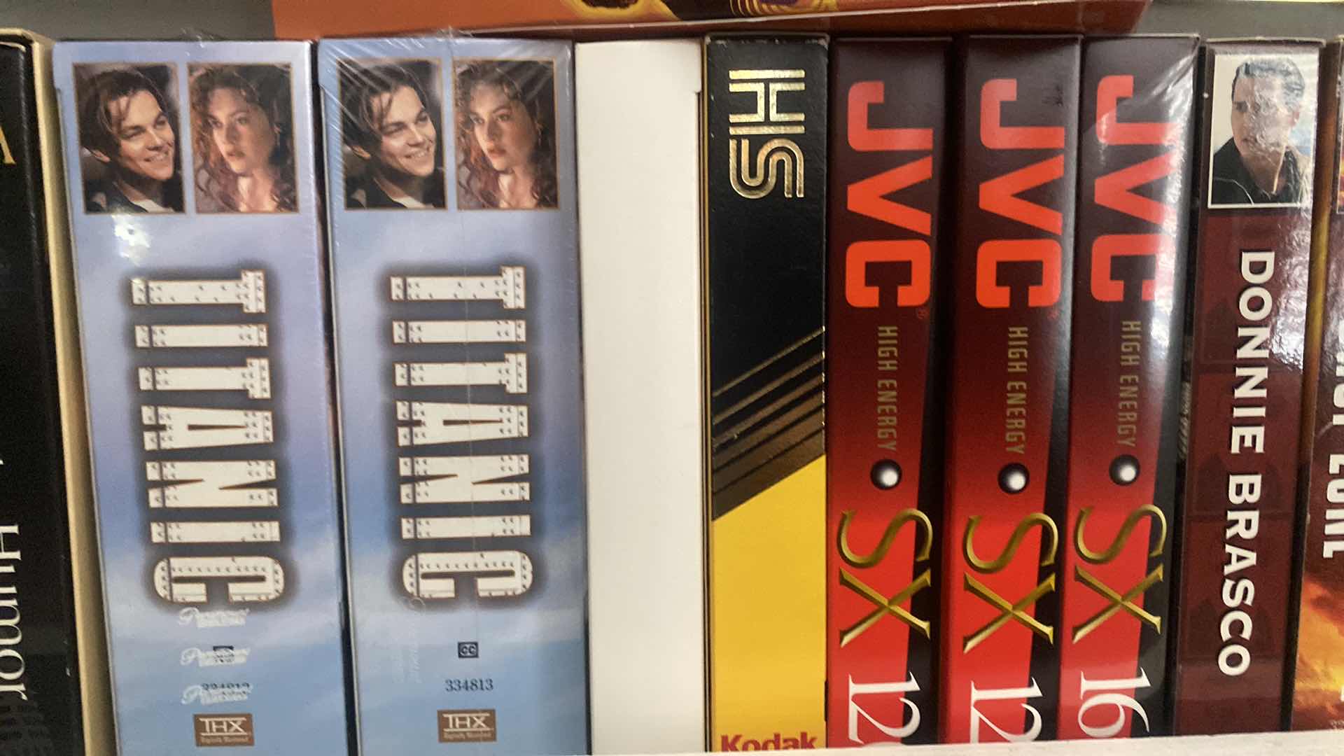 Photo 1 of SHELF OF VHS MOVIES SEE PICTURES