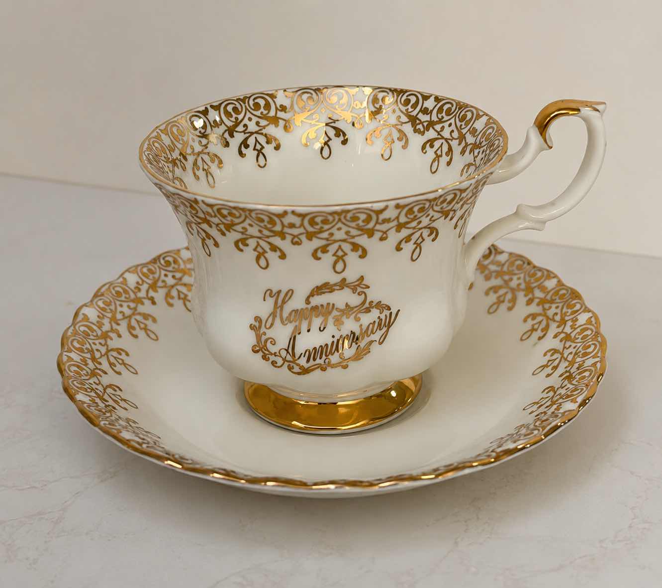 Photo 1 of ROYAL ALBERT FINE BONE CHINA, HAPPY ANNIVERSARY TEA CUP AND SAUCER