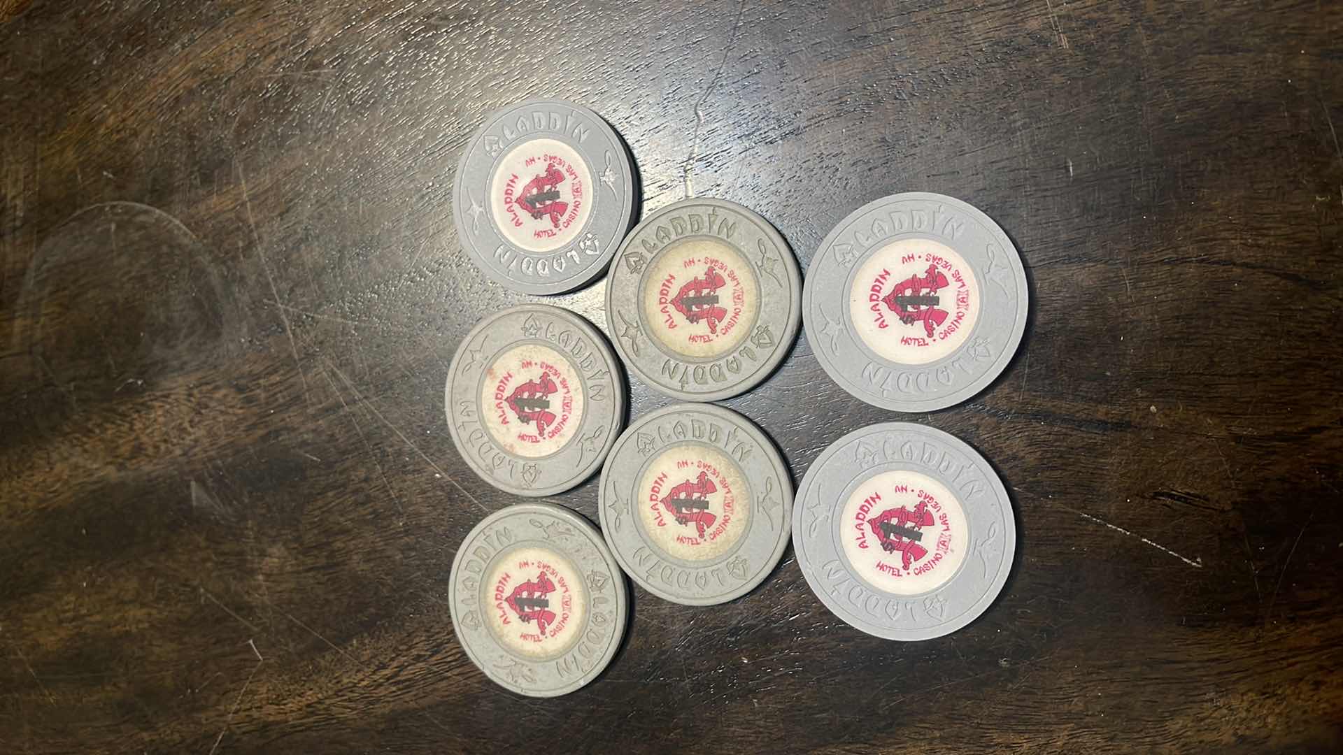 Photo 1 of (7) VINTAGE ALADDIN CASINO GAME CHIPS