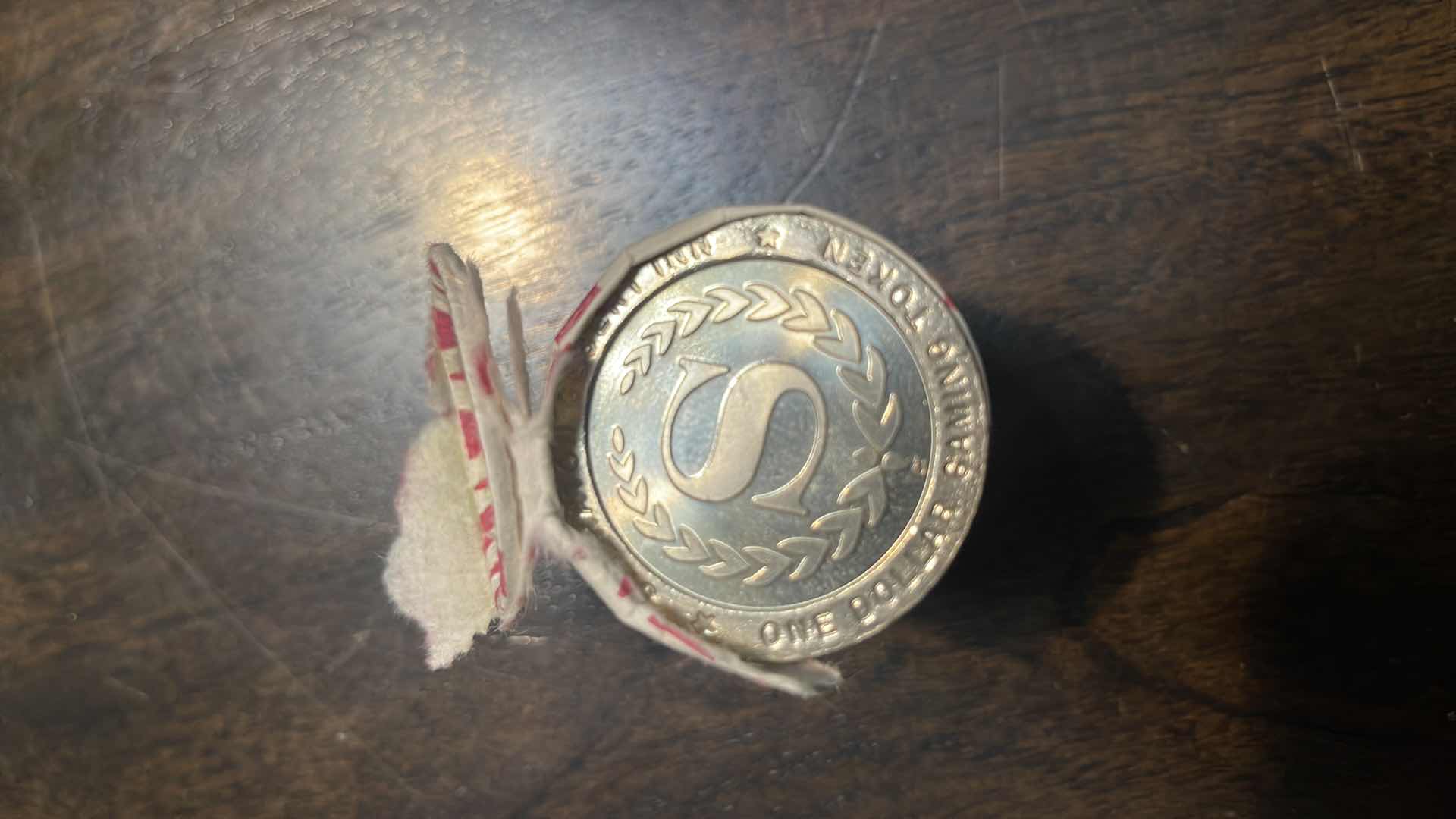 Photo 1 of $20 ROLL OF VINTAGE SILVERTON DESERT INN 1$ COINS