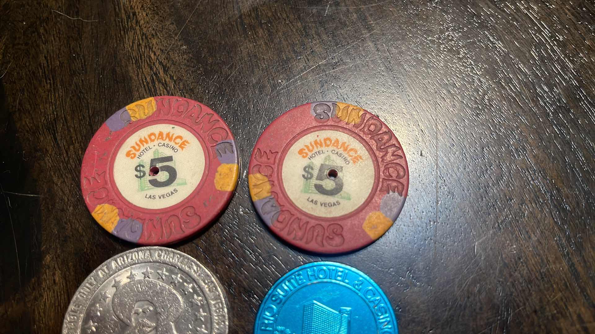 Photo 1 of (4) VINTAGE COLLECTOR’S GAMING CHIPS & COINS