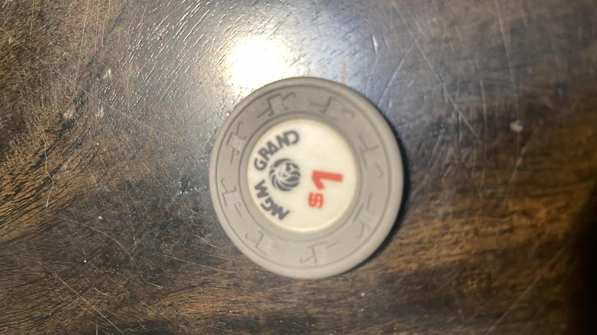 Photo 1 of RARE MGM 3RD EDITION $1 GAMING CHIP