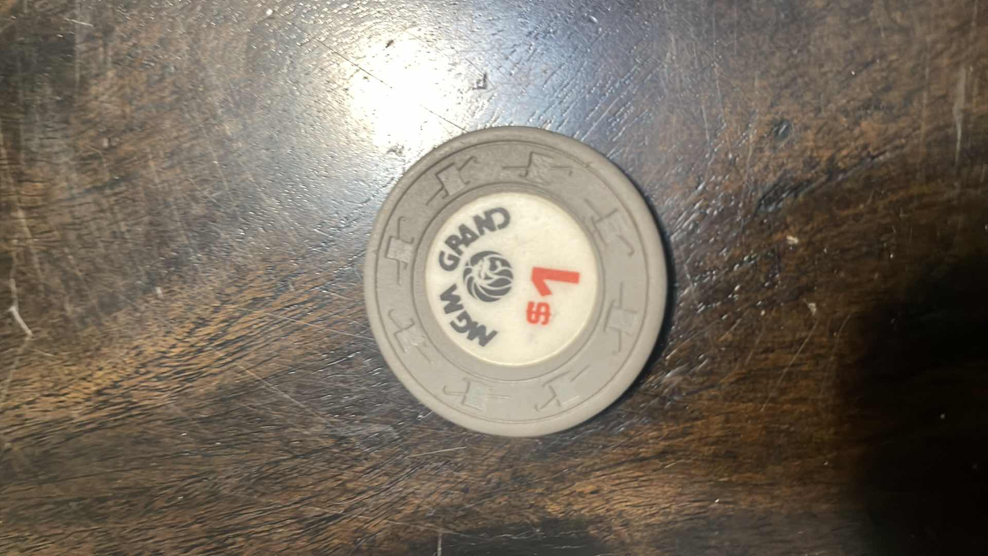 Photo 1 of RARE MGM 3RD EDITION $1 GAMING CHIP