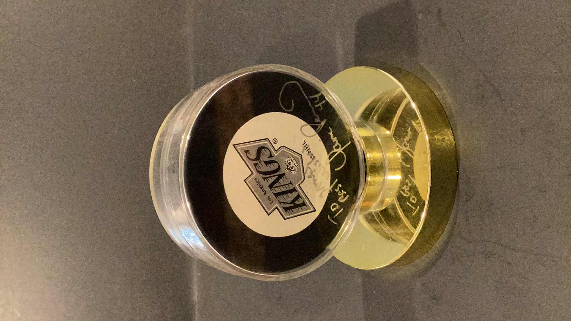 Photo 1 of 1996 AUTOGRAPHED PUCK LOS ANGELES KINGS YANIC PERREAULT #41