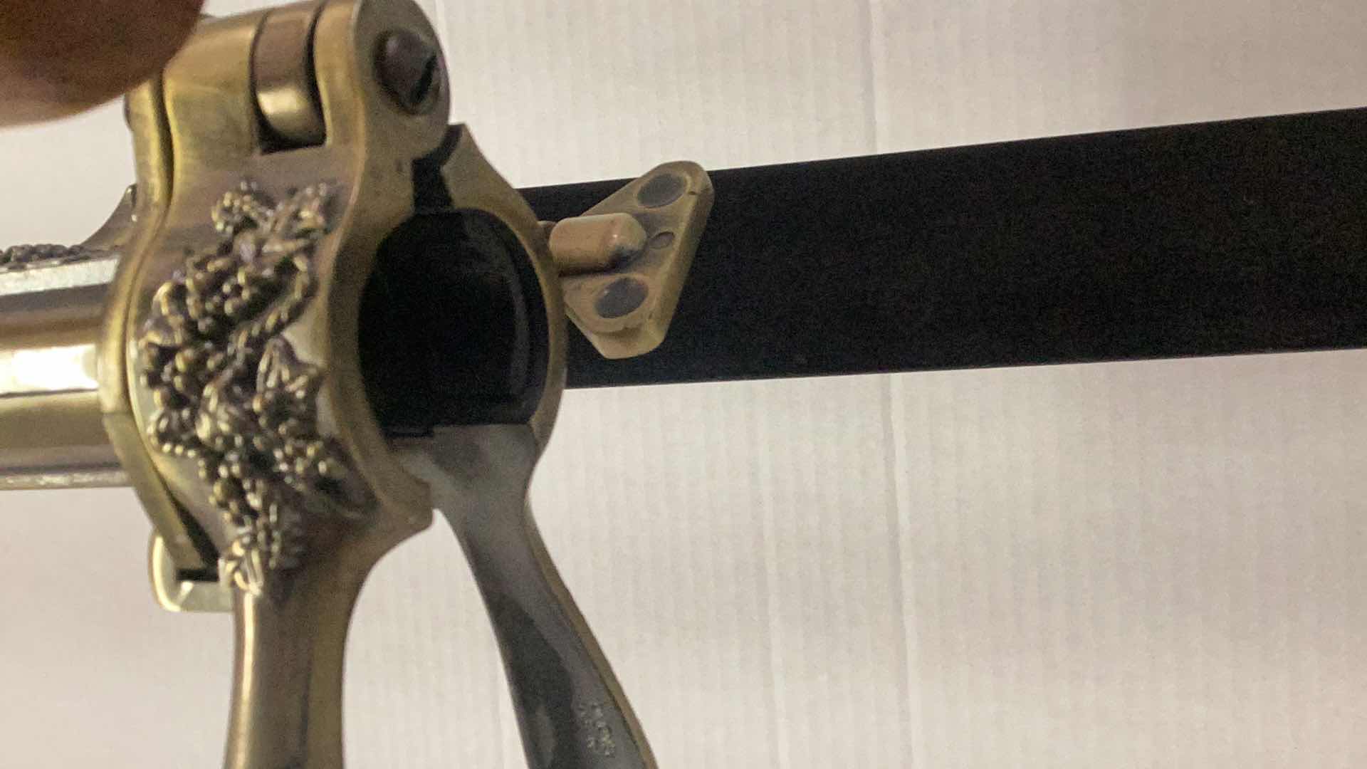 Photo 1 of LARGE ESTATE WINE BOTTLE OPENER 12” X H 23”