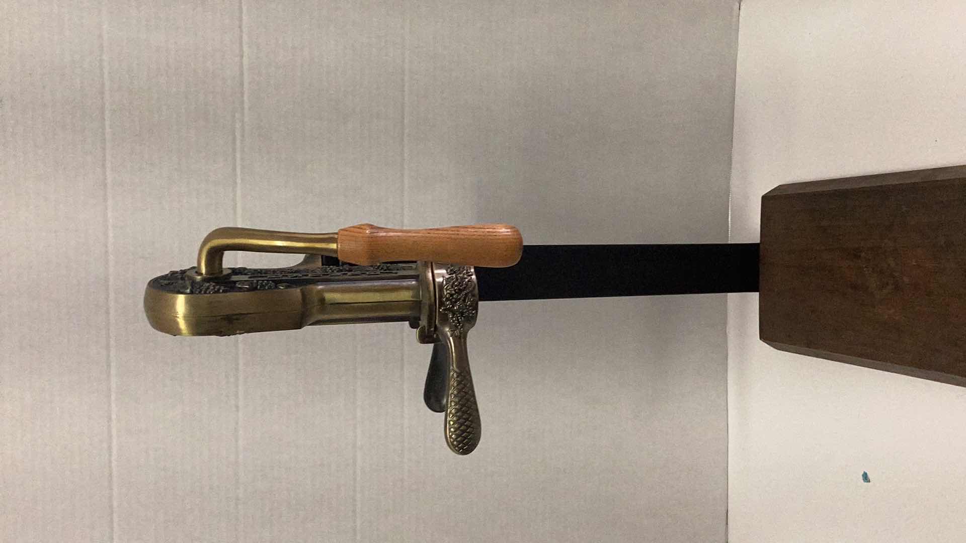 Photo 1 of LARGE ESTATE WINE BOTTLE OPENER 12” X H 23”