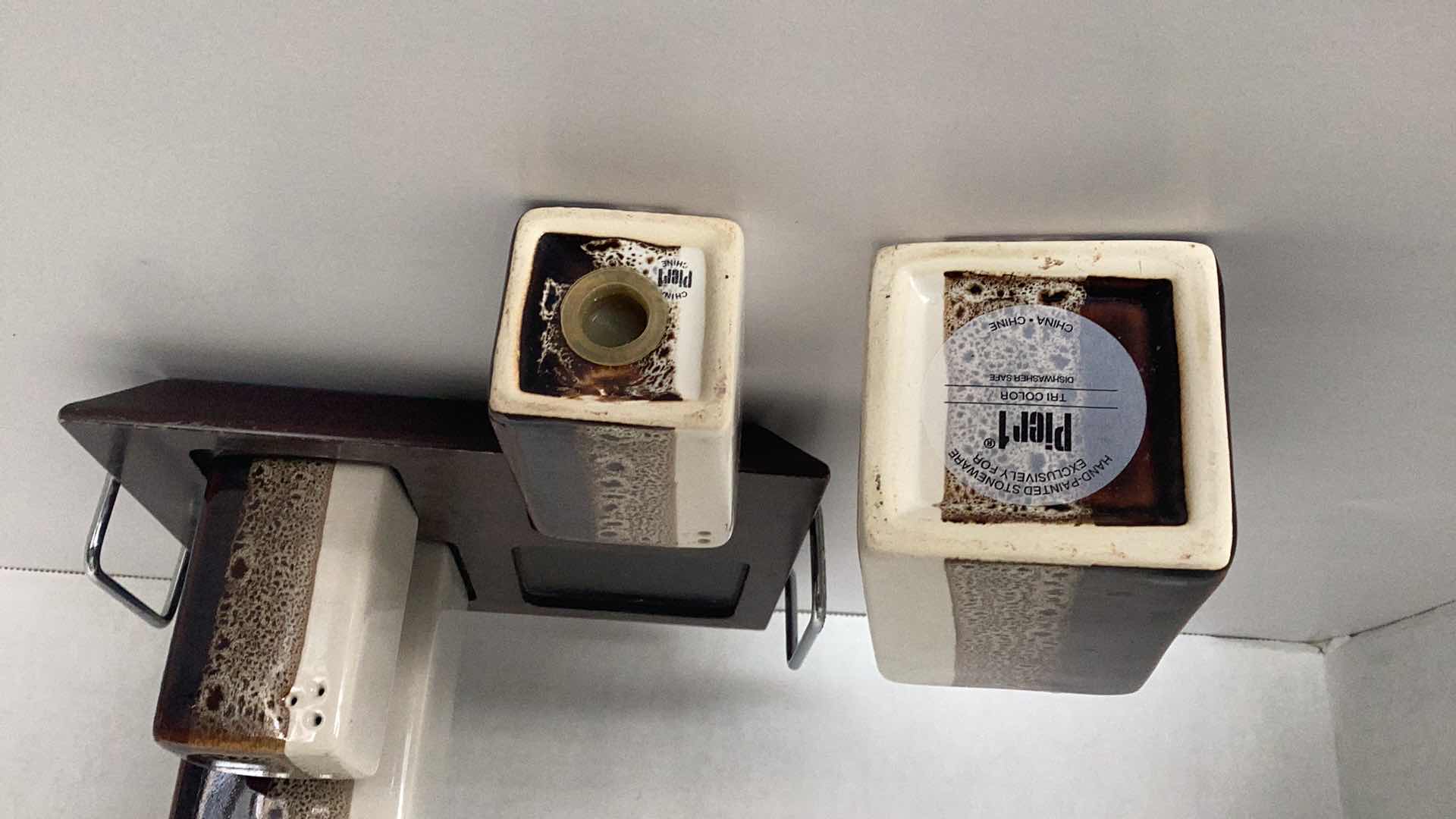 Photo 1 of PIER ONE IMPORTS OIL AND VINEGAR CONTAINERS AND SALT AND PEPPER SHAKERS