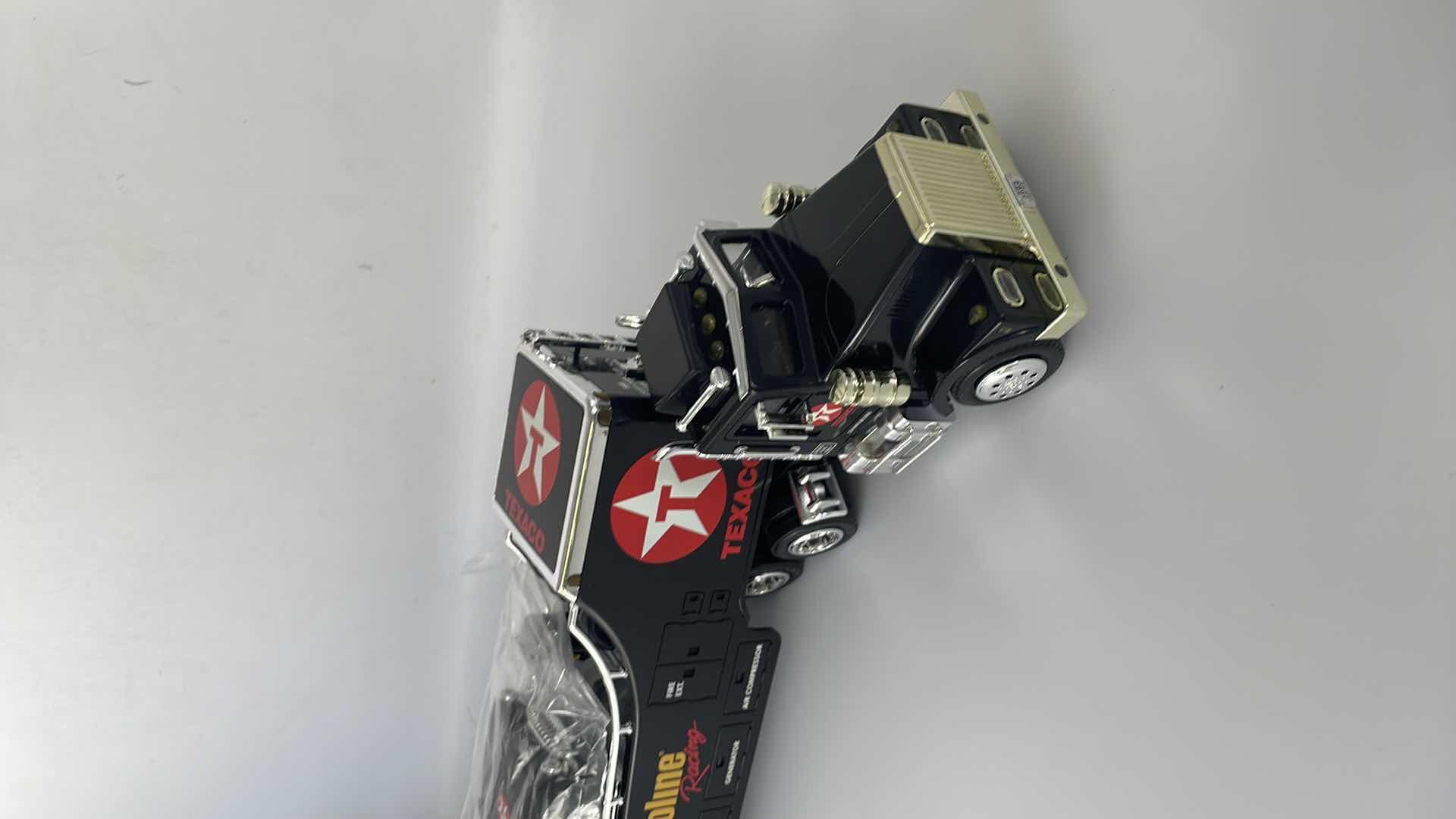 Photo 1 of TEXACO 1999 CREDIT CARD EDITION CAR CARRIER TRUCK 4TH IN COLLECTOR SERIES