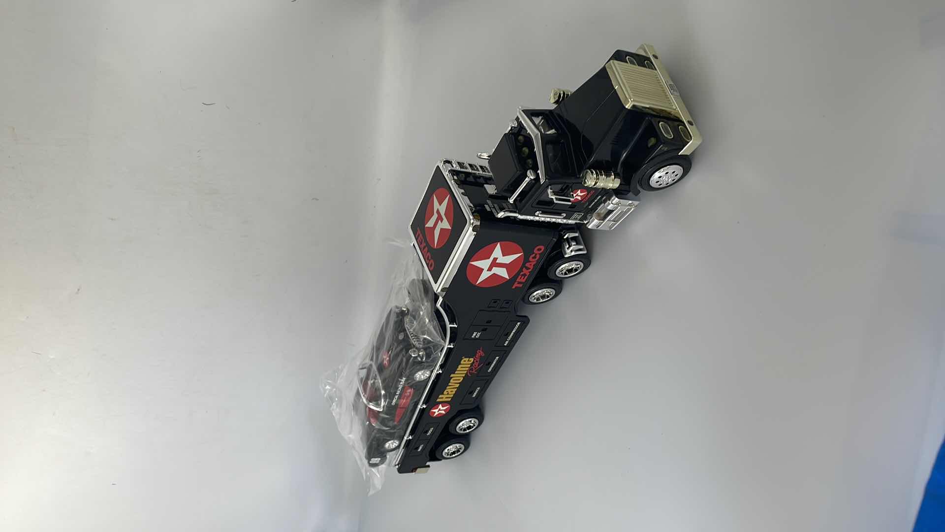 Photo 1 of TEXACO 1999 CREDIT CARD EDITION CAR CARRIER TRUCK 4TH IN COLLECTOR SERIES