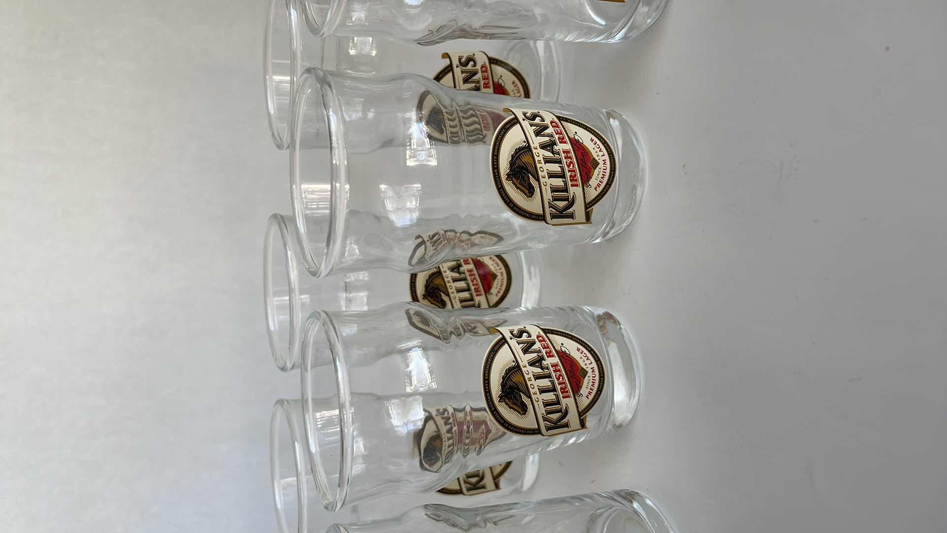 Photo 1 of SET OF 9 GEORGE KILLIAN’S IRISH RED GLASSES  3 1/3” TALL