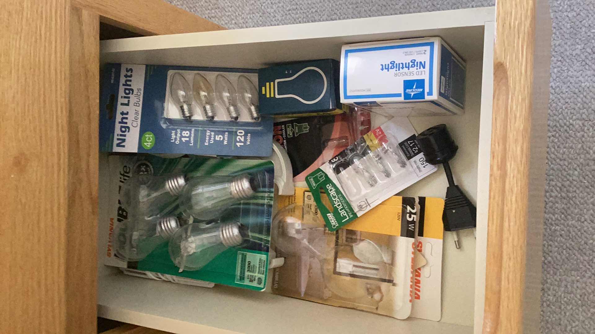 Photo 1 of CONTENTS OF DRAWER AND UNDER SINK