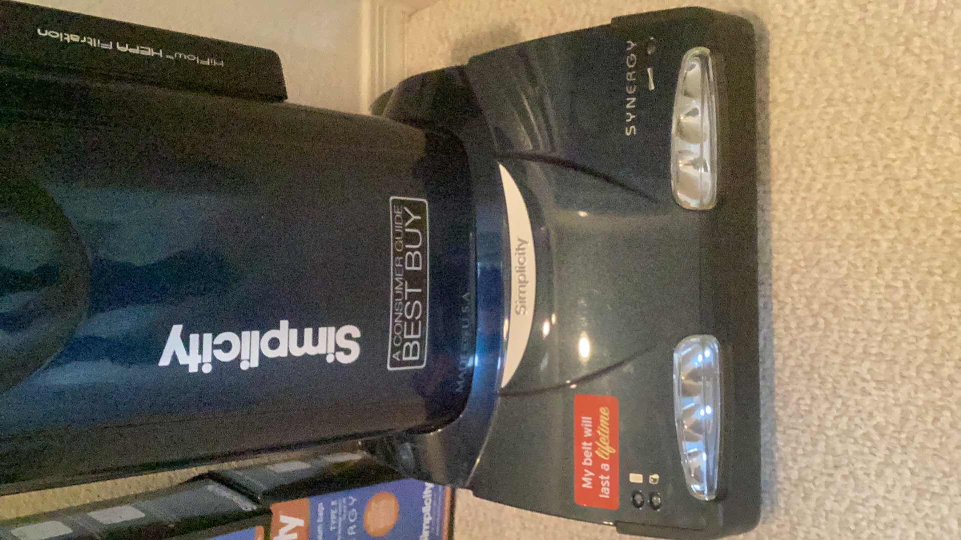 Photo 1 of SIMPLICITY SYNERGY VACUUM CLEANER WITH EXTRA BAGS POWERS ON