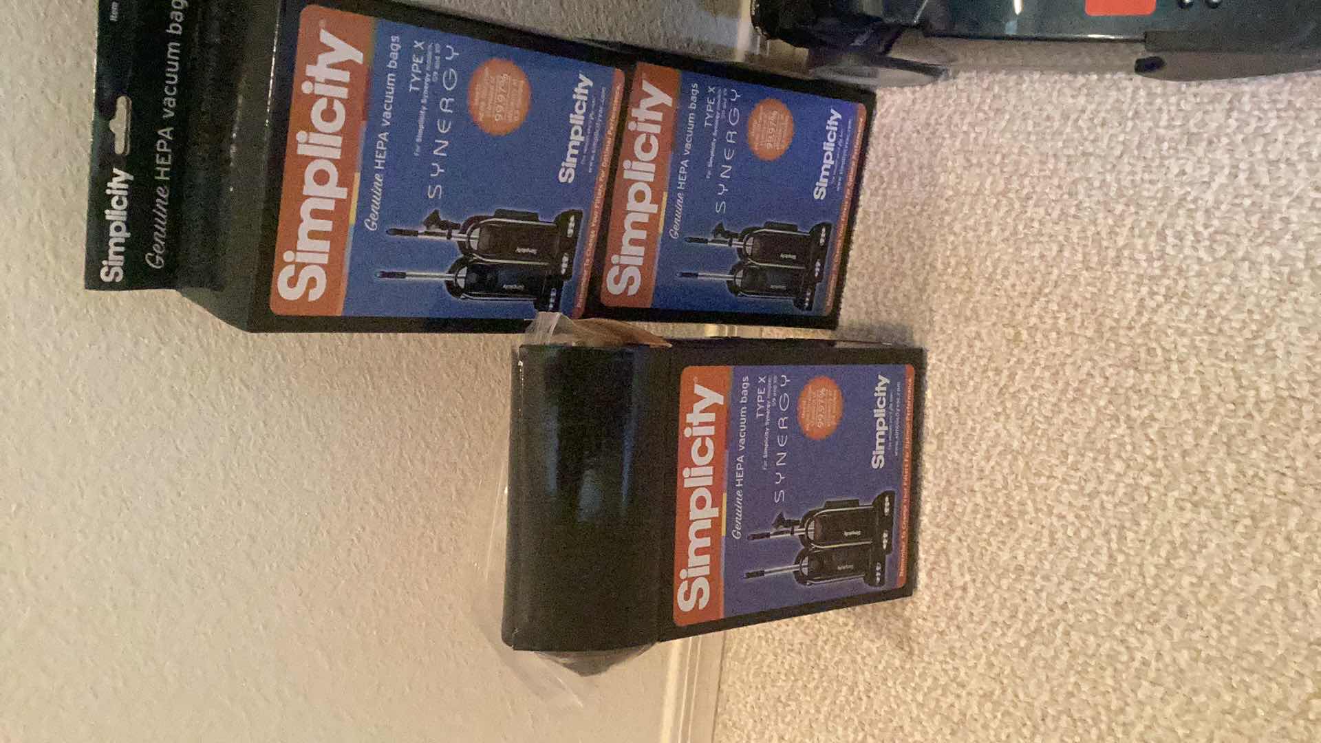 Photo 1 of SIMPLICITY SYNERGY VACUUM CLEANER WITH EXTRA BAGS POWERS ON