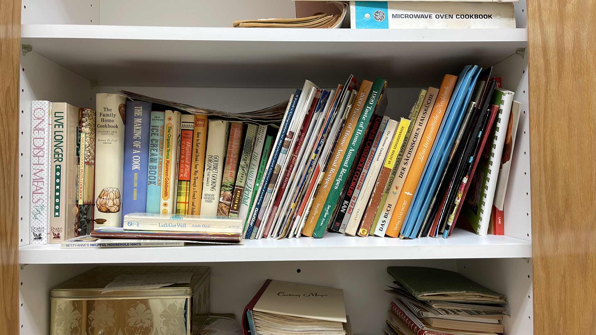 Photo 1 of CONTENTS OF CABINET COOK BOOKS