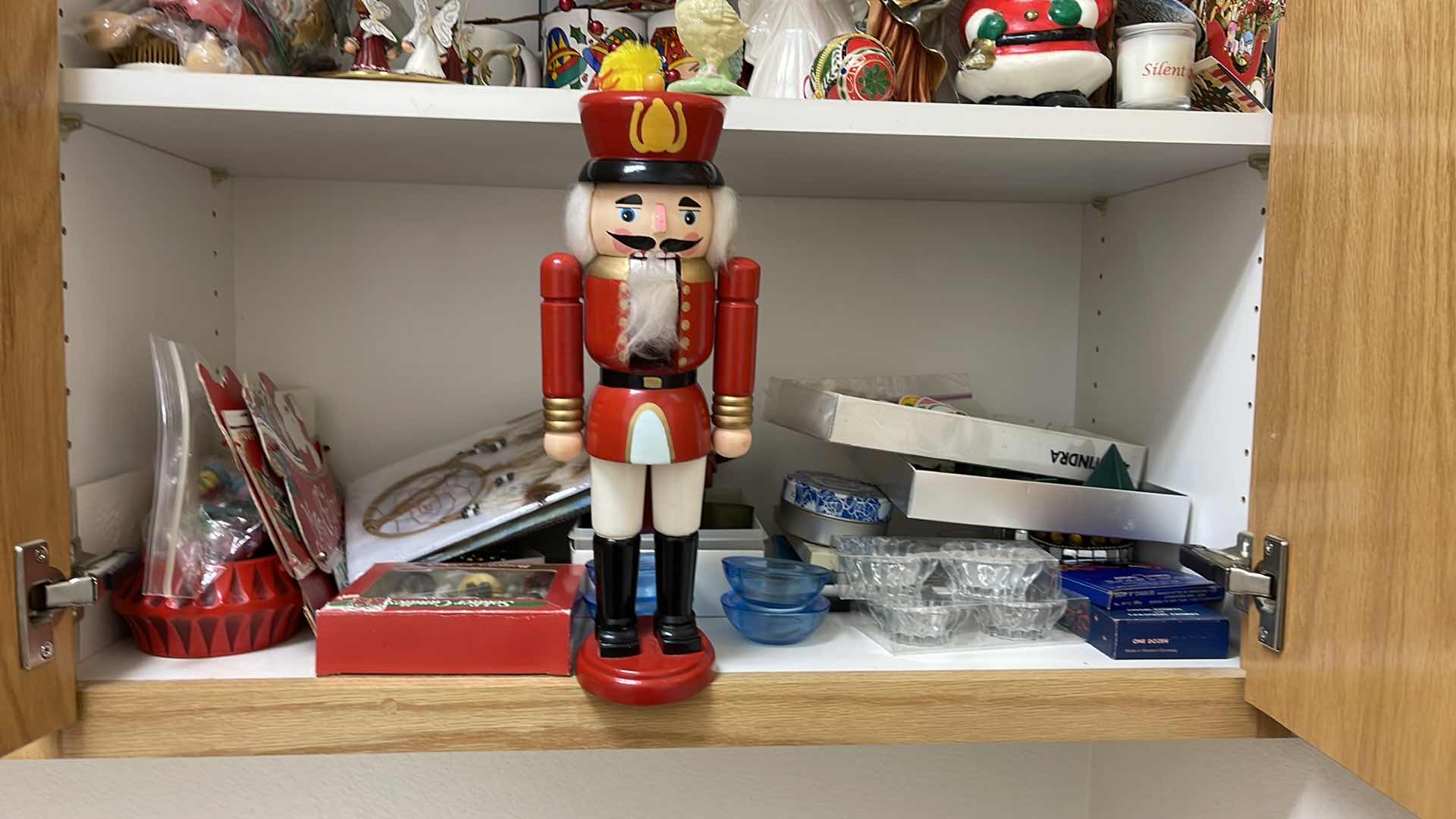 Photo 1 of CONTENTS OF CABINET CHRISTMAS DECOR