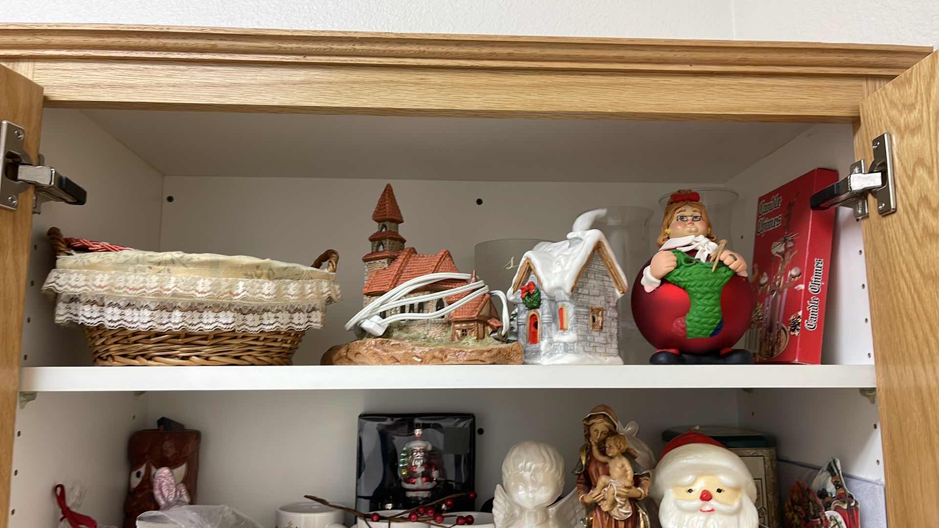 Photo 1 of CONTENTS OF CABINET CHRISTMAS DECOR