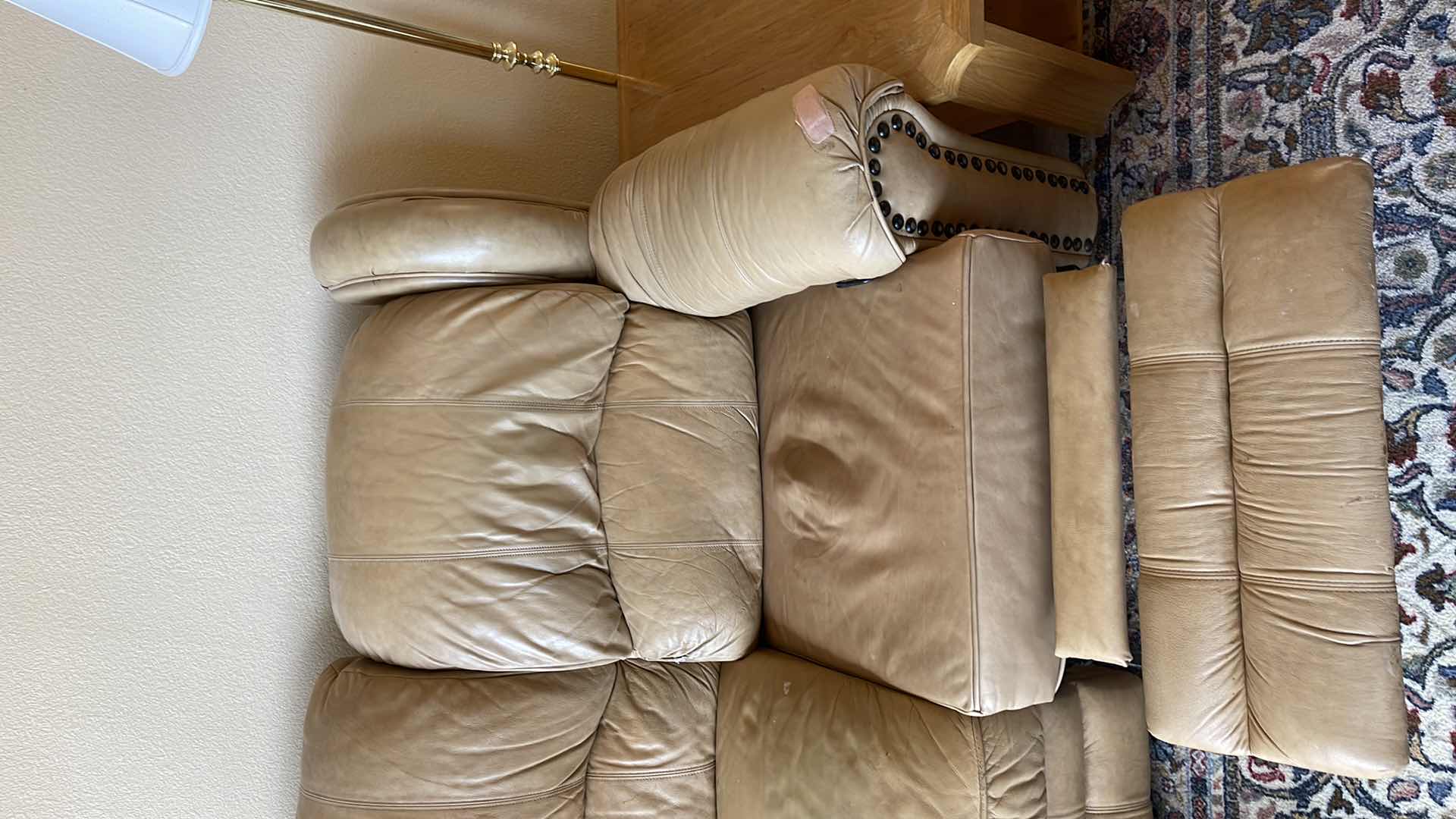 Photo 1 of DOUGLAS 7.5’ LEATHER RECLINING SOFA (MATCHING LOVESEAT SOLD SEPARATELY) HAS TEAR IN ARM