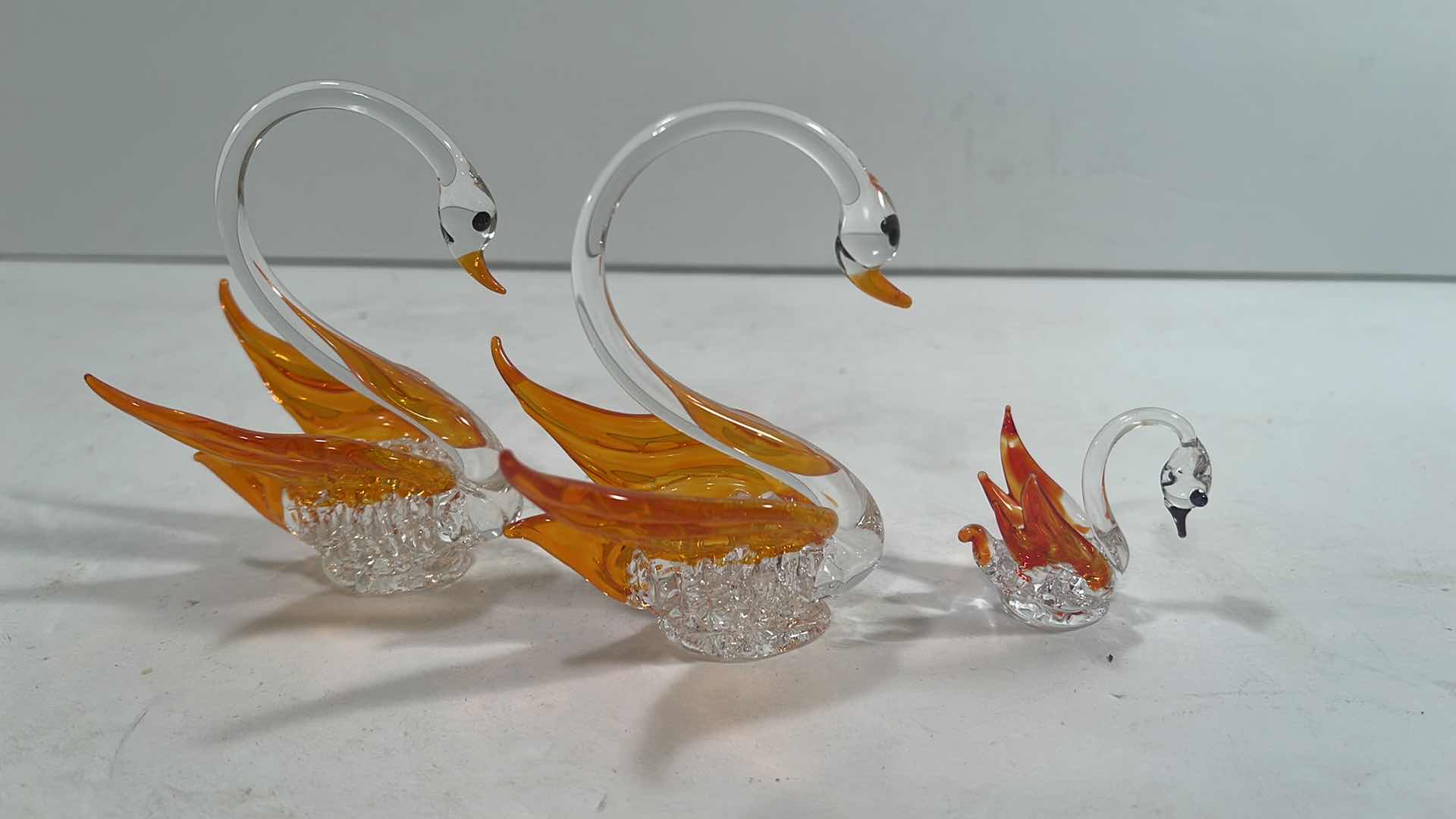 Photo 1 of HANDBLOWN GLASS SWANS