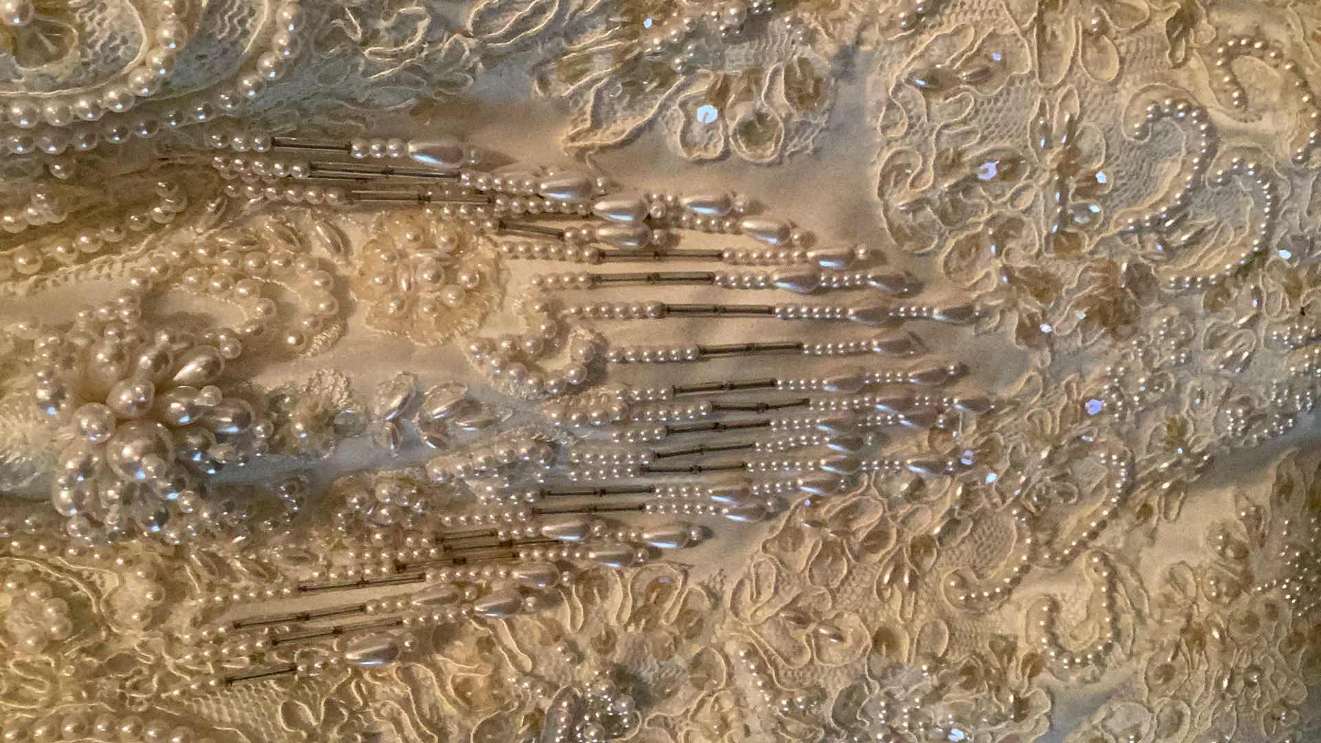 Photo 1 of BEAUTIFUL OLEG CASSINI  MERMAID BOTTOM WEDDING DRESS -PEEK A BOO  NECKLINE & OPEN BACK-APPROXIMATE SIZE 6