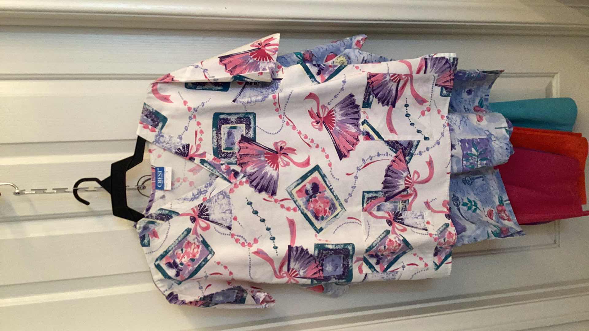 Photo 1 of FLORAL SCRUBS 13 SHIRTS 4 PANTS