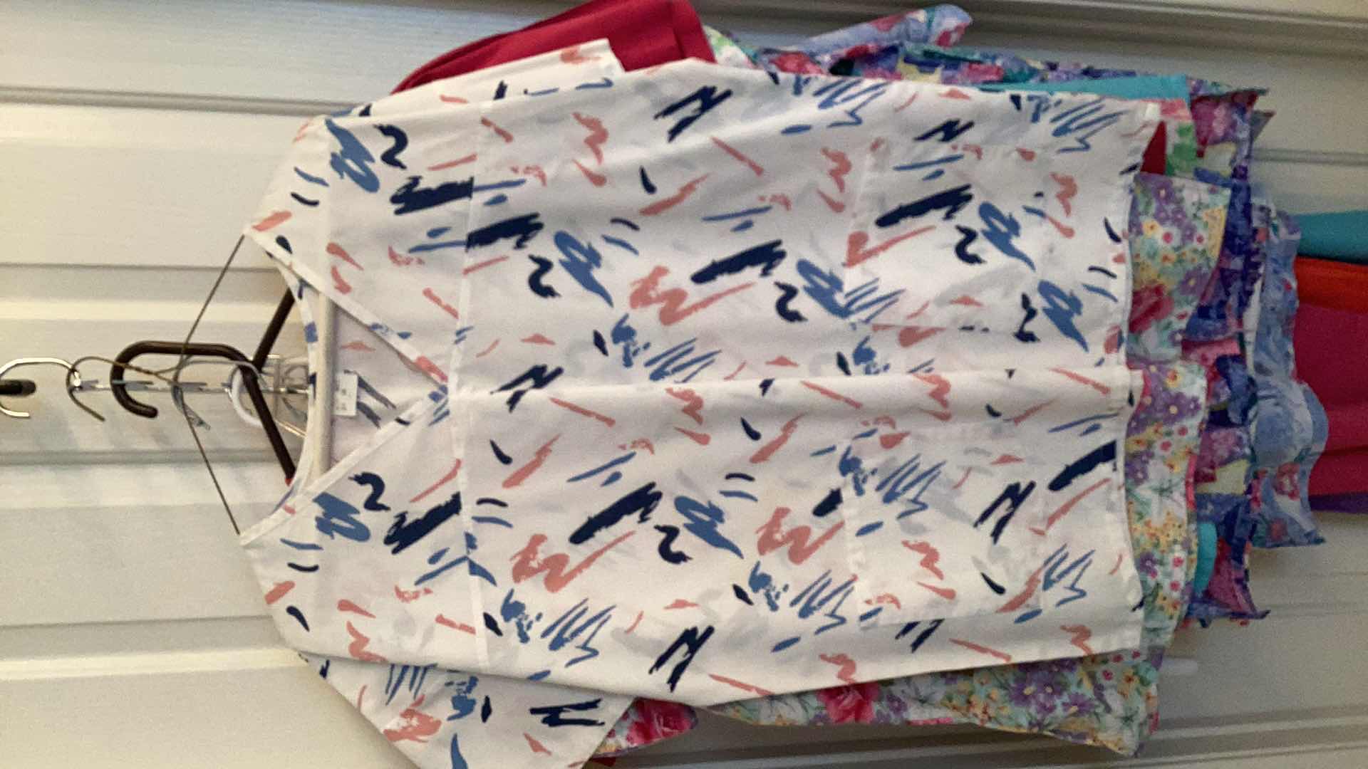 Photo 1 of FLORAL SCRUBS 13 SHIRTS 4 PANTS