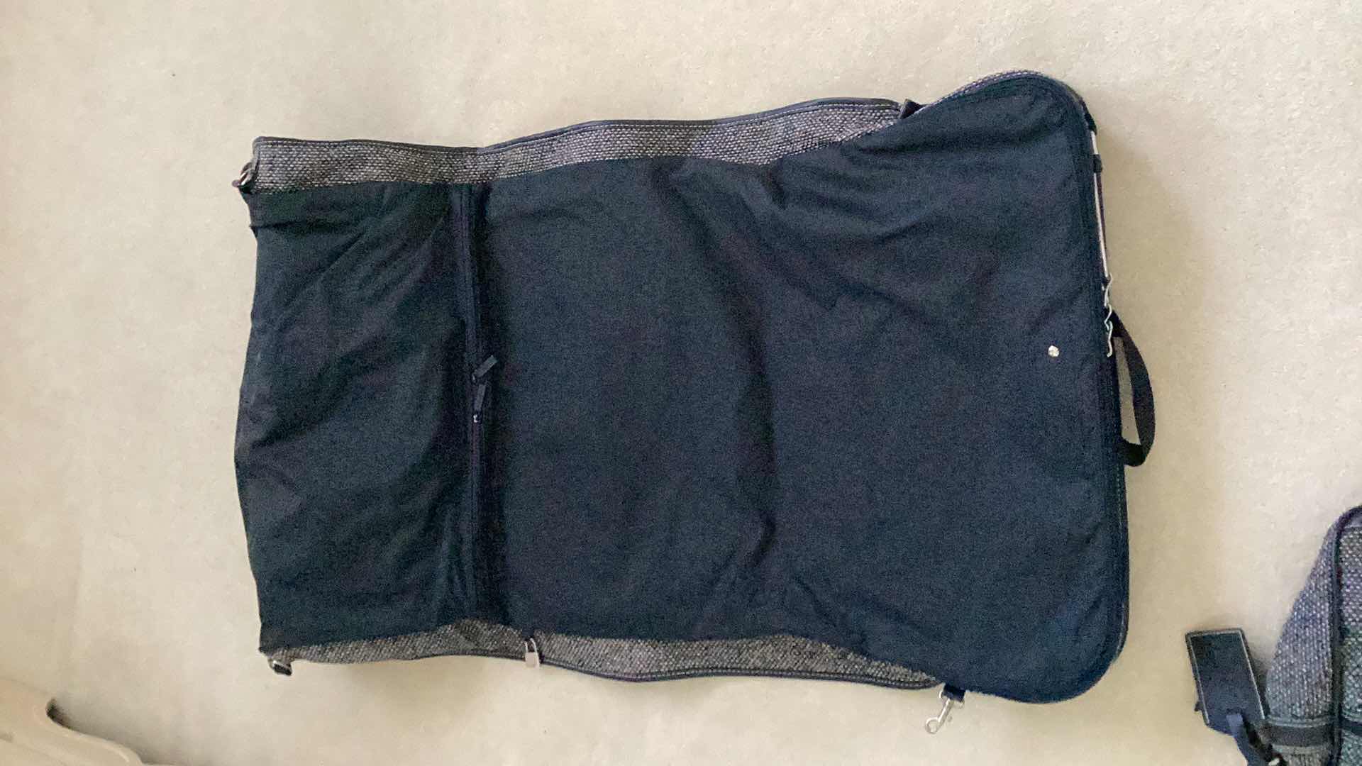 Photo 1 of JORDACH 4 PIECE TRAVEL SET - SUITCASE, GARMENT BAG, WEEKENDER  & SHOULDER BAG