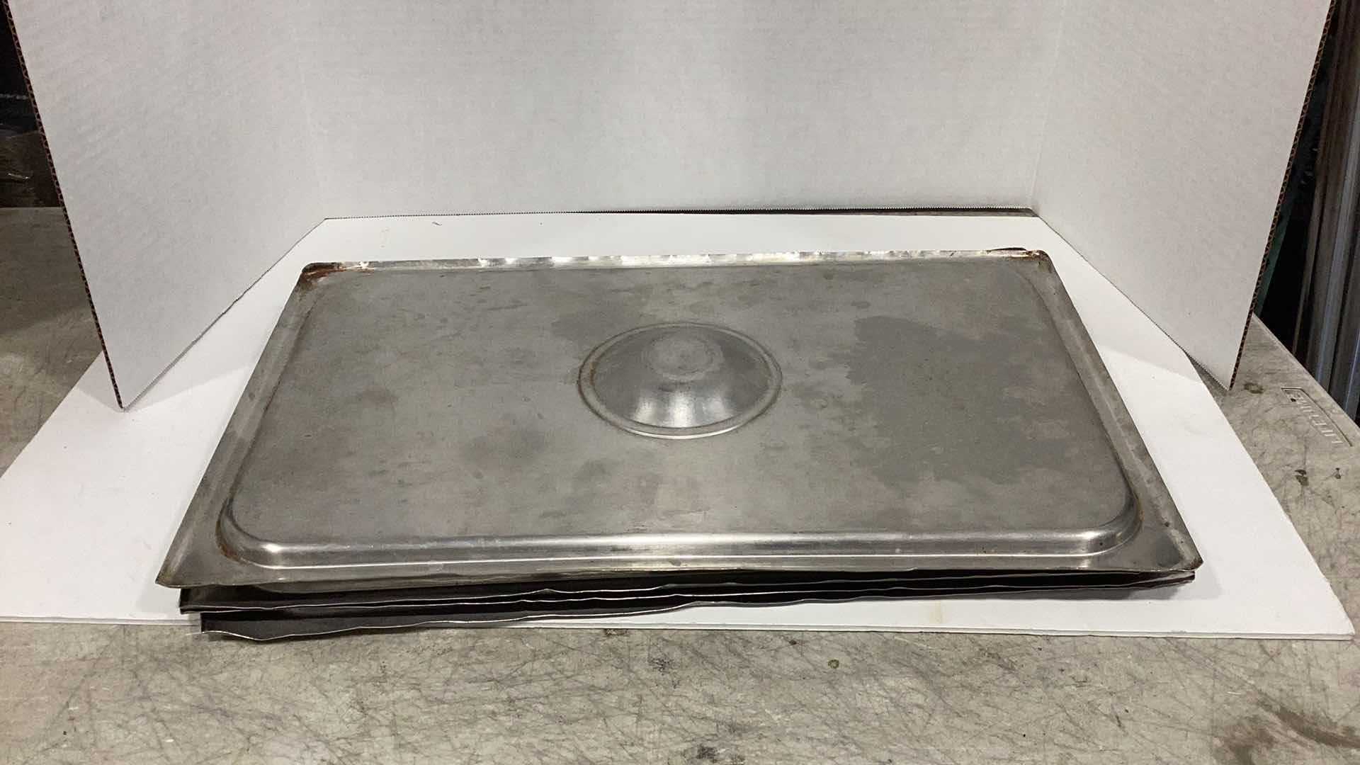 Photo 1 of FOUR STEEL COOKING COVERS 13" X 21"