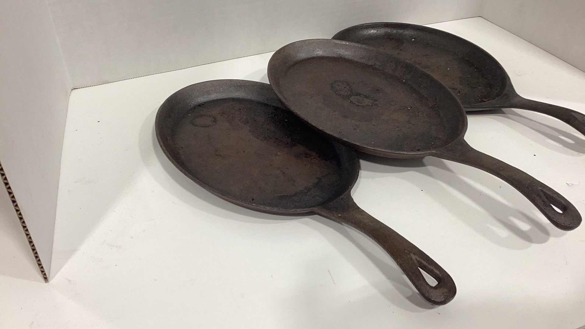 Photo 1 of THREE METAL STEAK IRONS