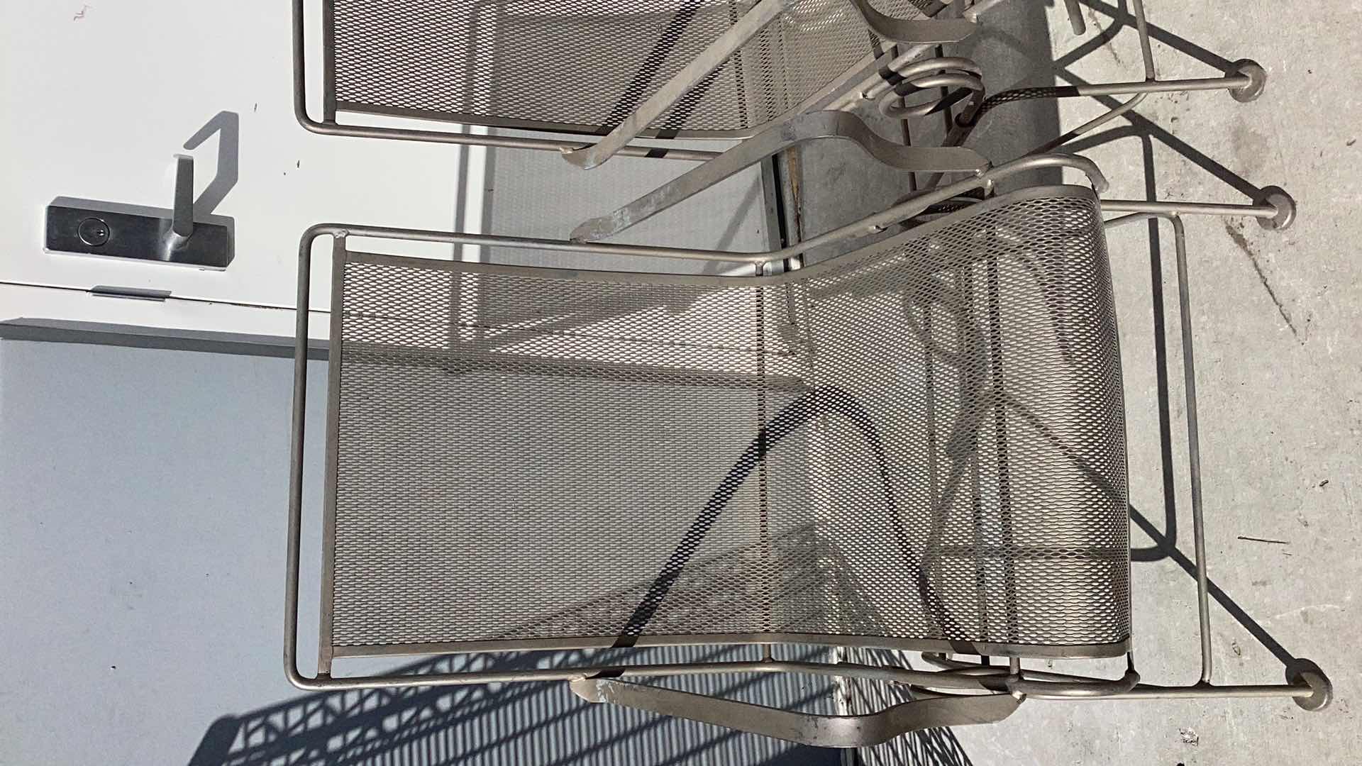 Photo 2 of TWO WROUGHT IRON PATIO CHAIRS