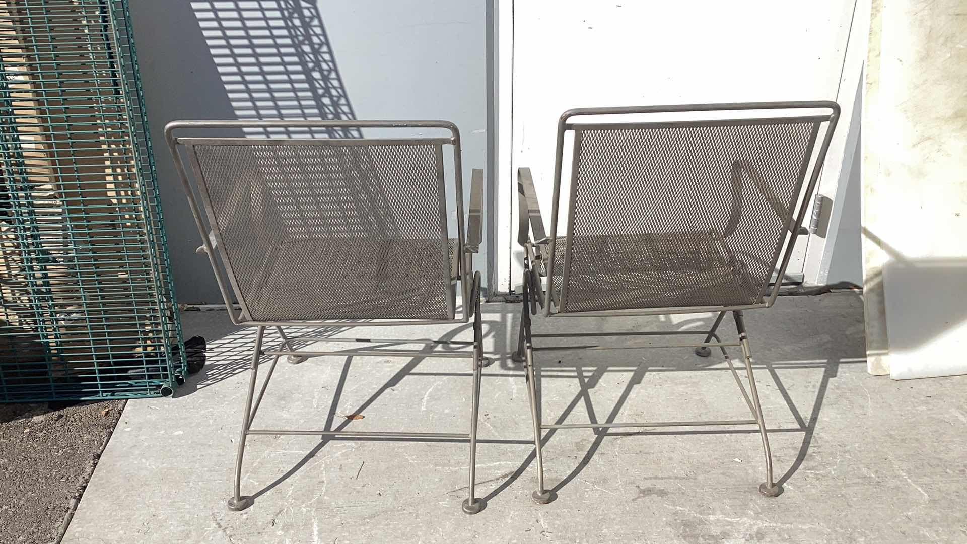 Photo 1 of FOUR WROUGHT IRON PATIO CHAIRS