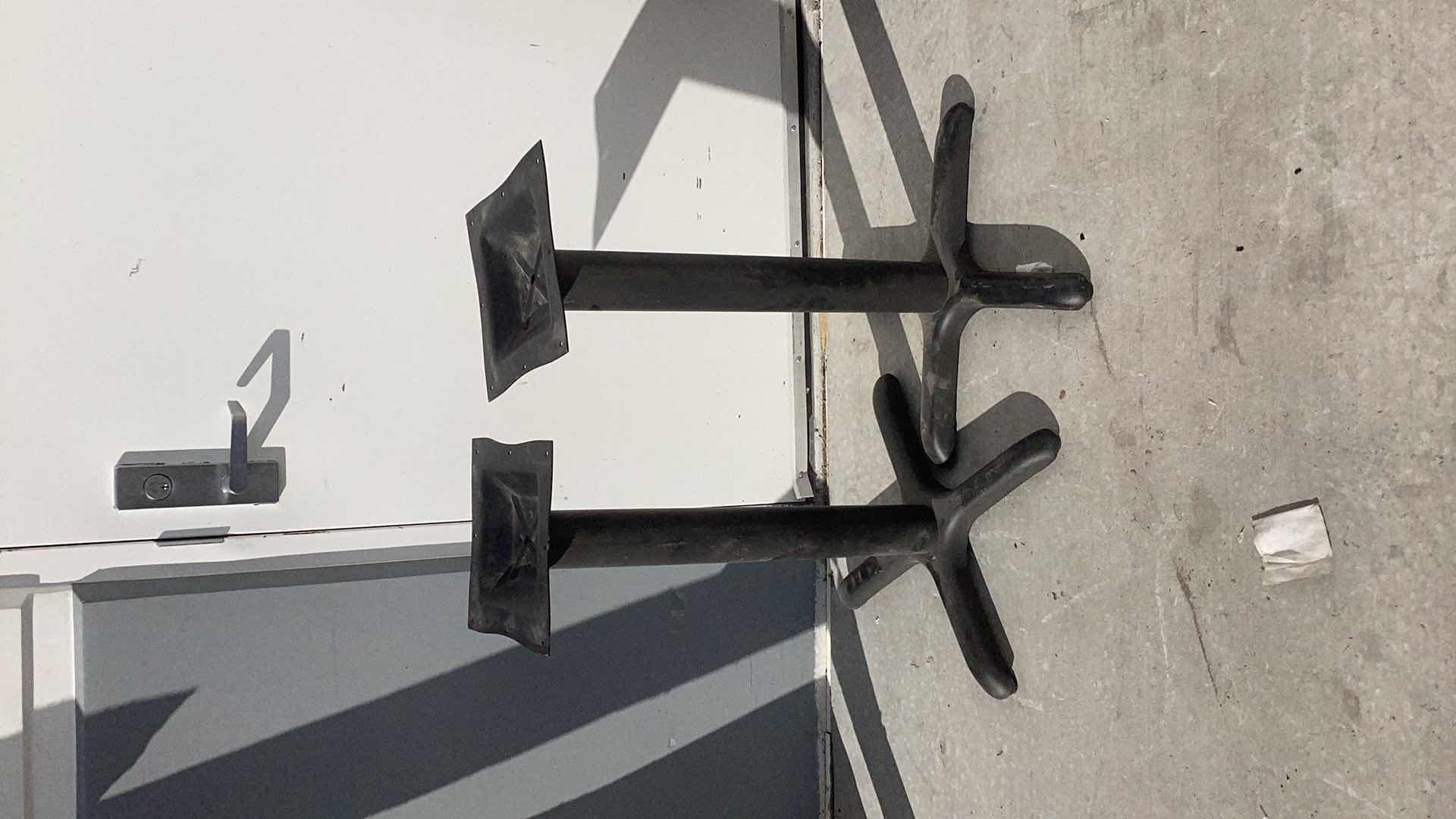 Photo 1 of TWO METAL TABLE STANDS