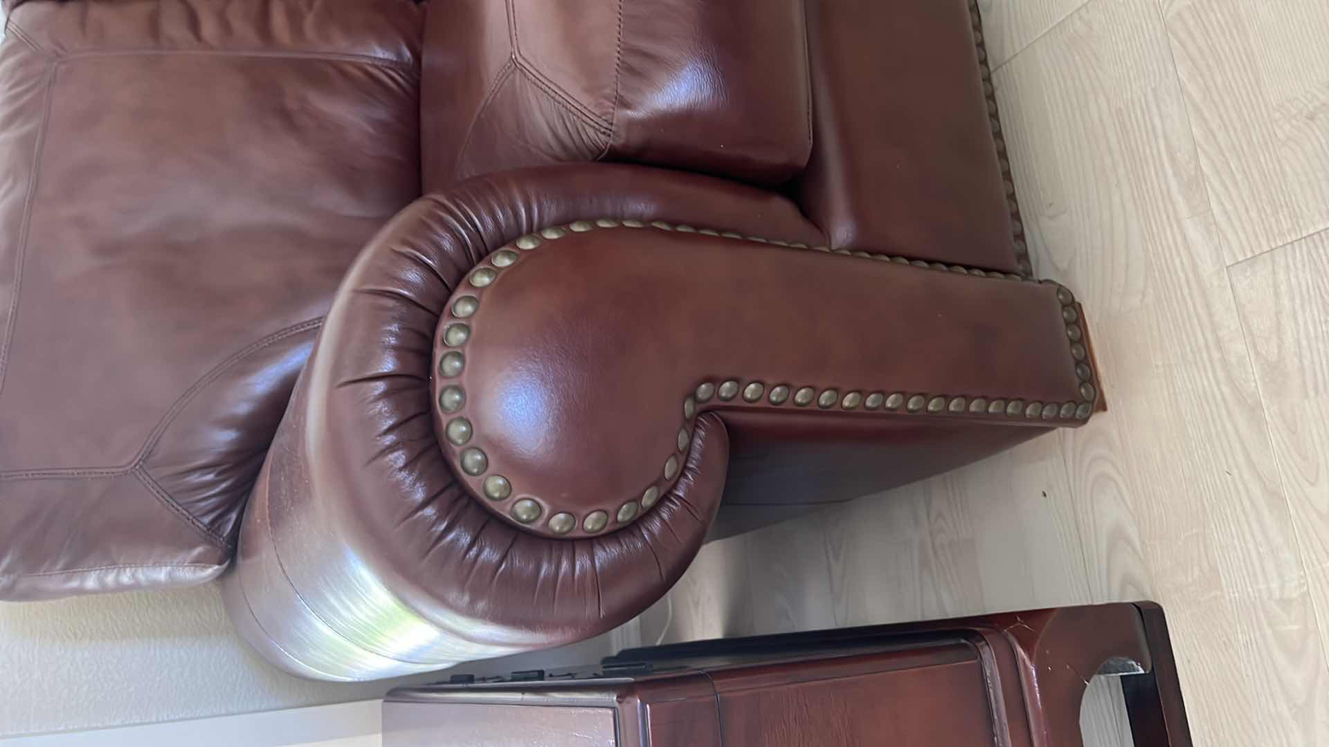 Photo 1 of BURGUNDY LEATHER SOFA W BRASS TACK TRIM 87” x 38”