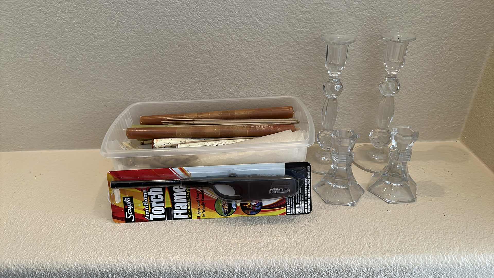 Photo 1 of BOX OF CANDLES AND TWO SET OF GLASS CANDLE HOLDERS