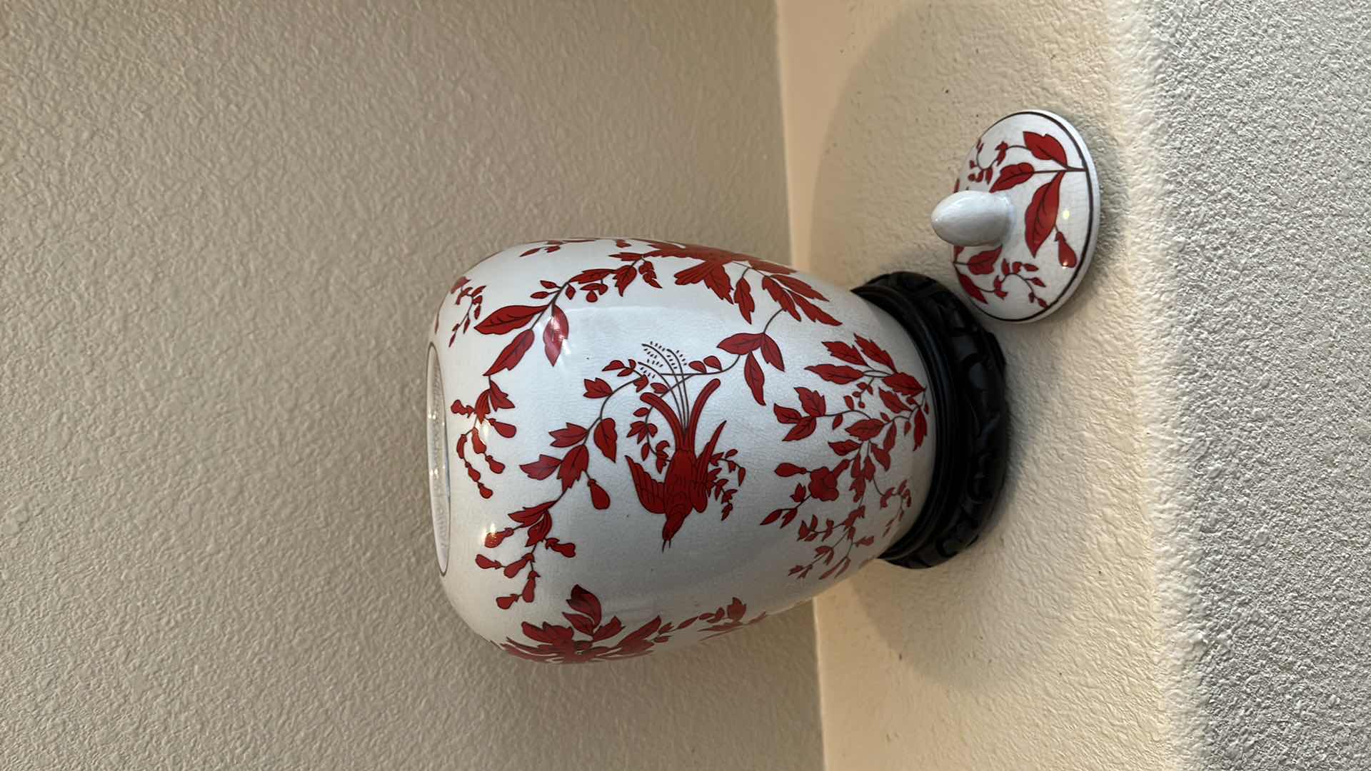 Photo 1 of PORCELAIN JAR W LID ON WOOD VASE