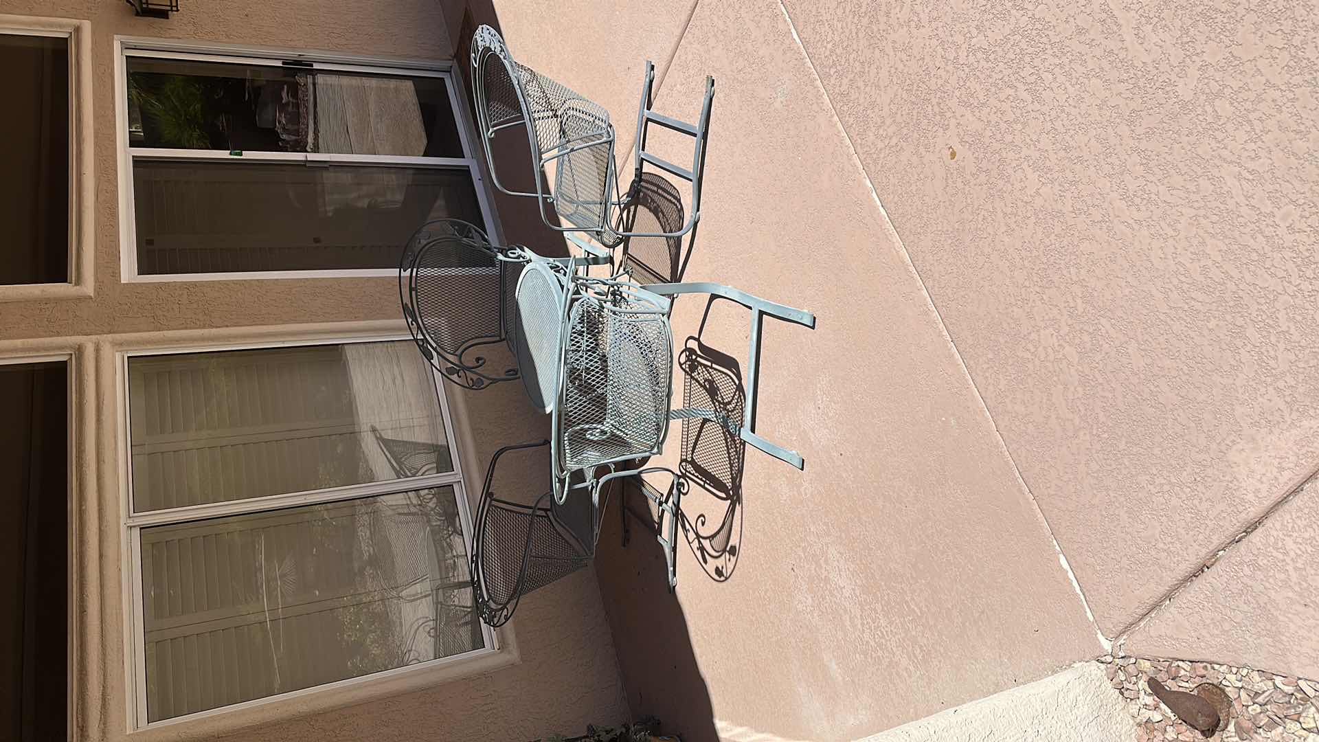 Photo 1 of GREEN WROUGHT IRON PATIO TABLE W 4 CHAIRS