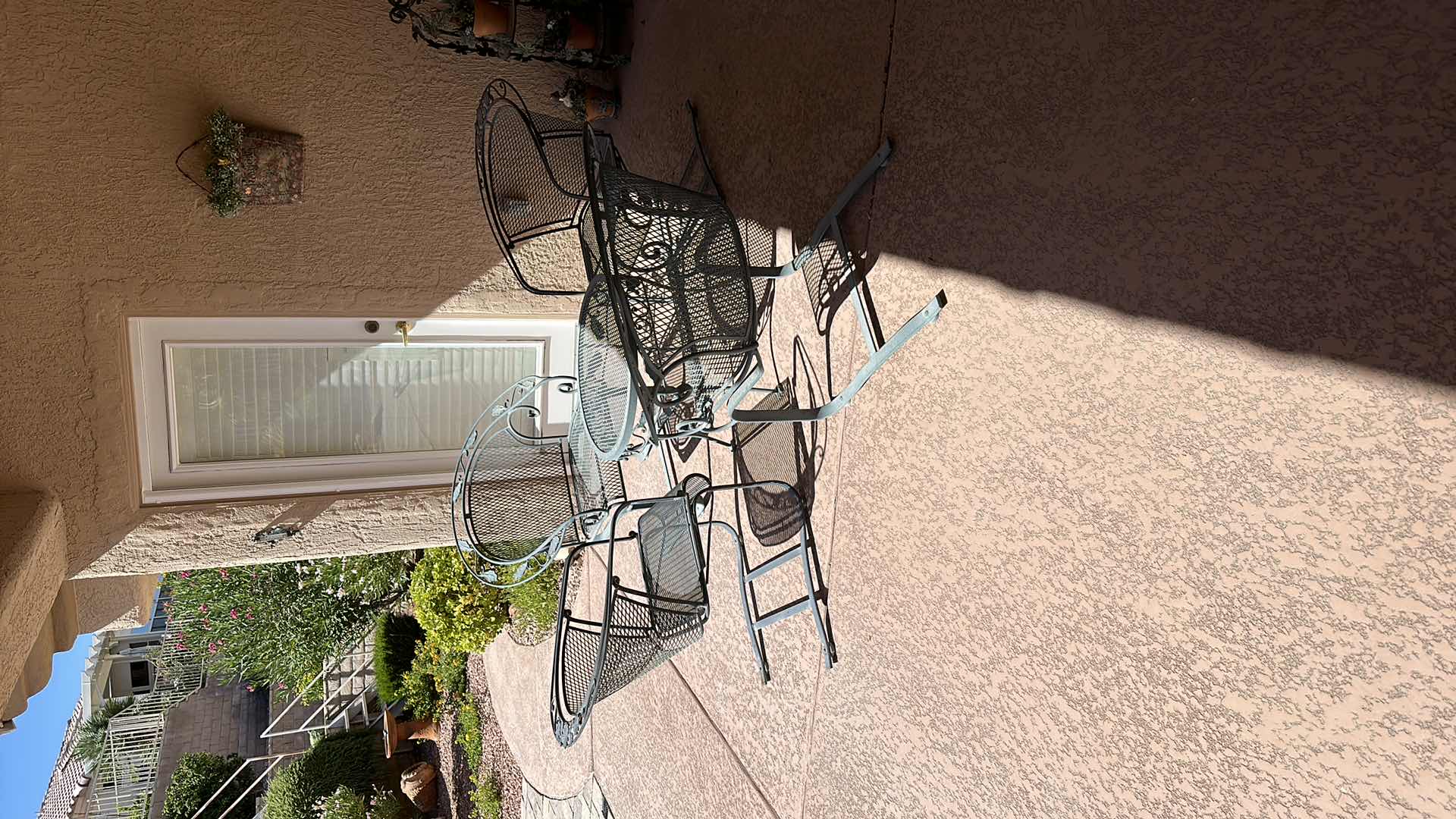 Photo 1 of GREEN WROUGHT IRON PATIO TABLE W 4 CHAIRS