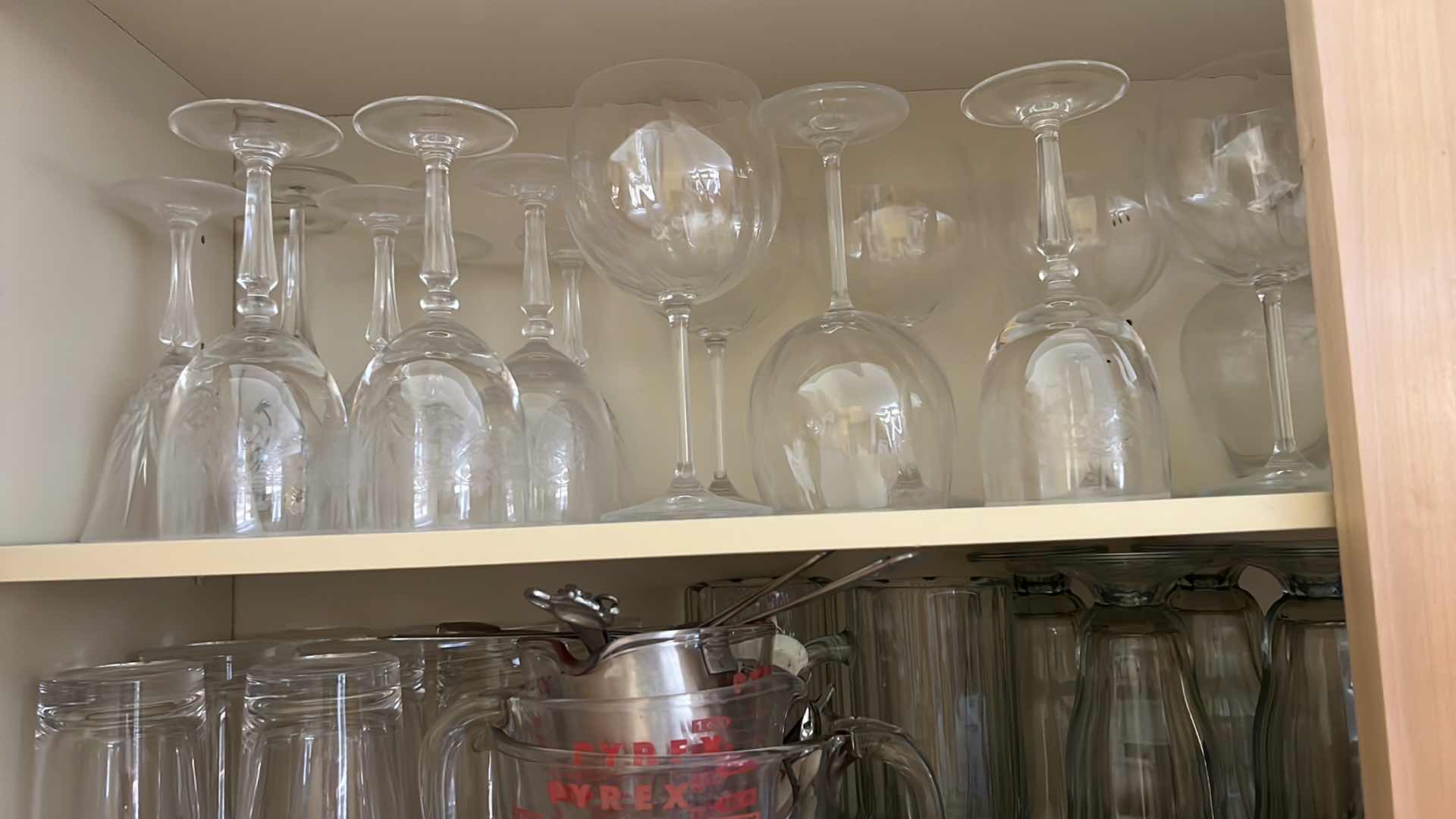 Photo 1 of CONTENTS OF KITCHEN CABINET-GLASSWARE