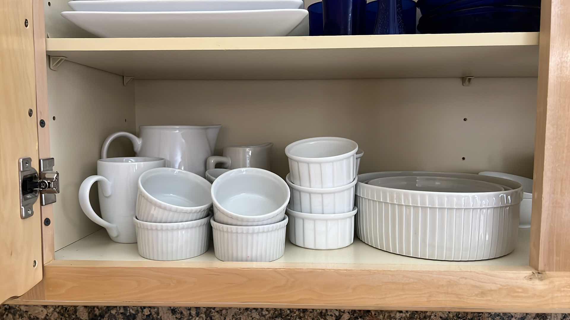 Photo 1 of CONTENTS OF KITCHEN CABINET-WHITE DISHWARE