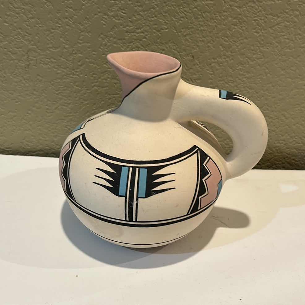 Photo 1 of INDIAN POTTERY SIGNED AND NUMBERED 8” x 7”