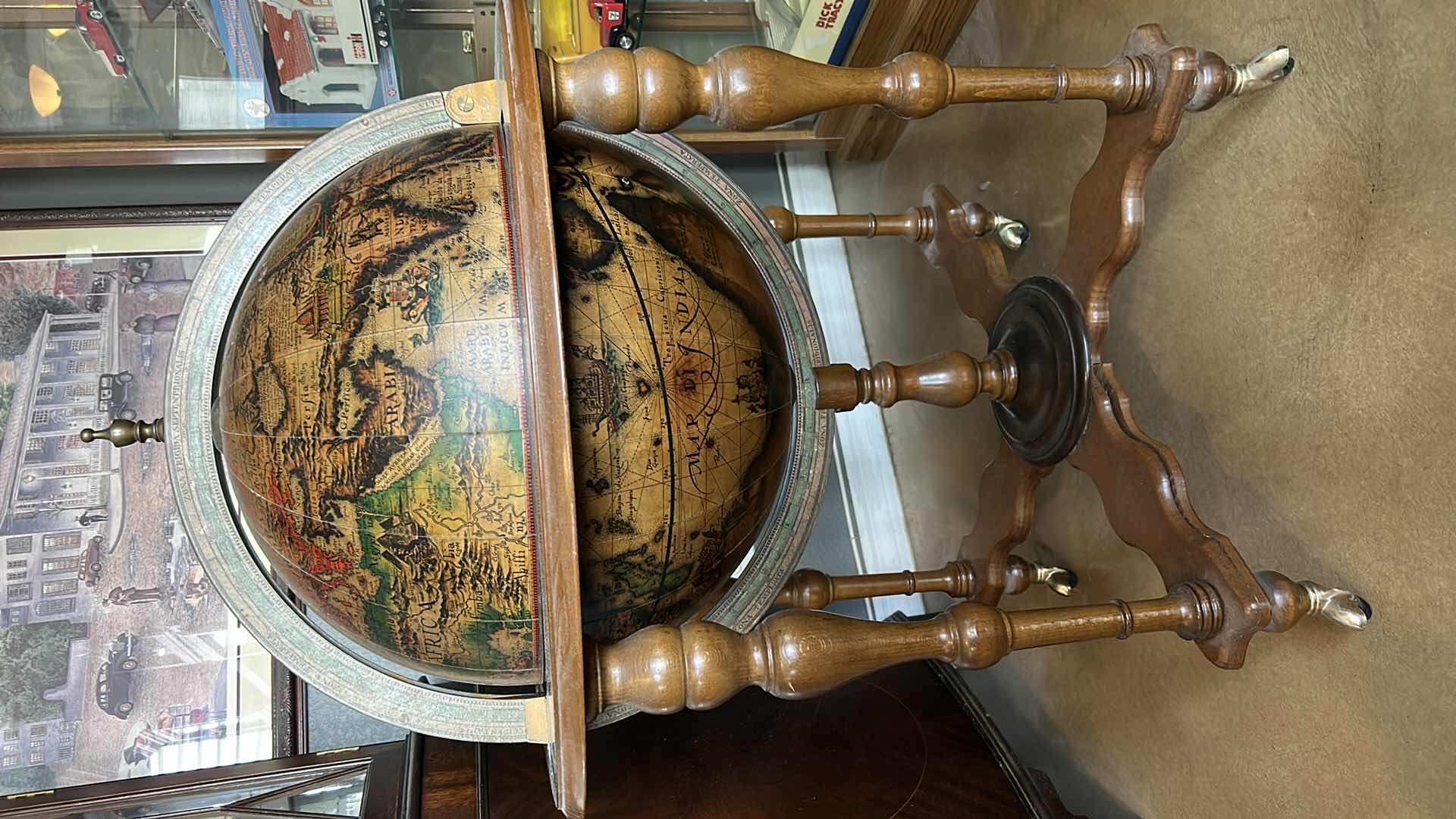 Photo 1 of VINTAGE GLOBE LIQUOR TABLE 29” x 39” (SOME DAMAGE, NEEDS TIGHTENING)